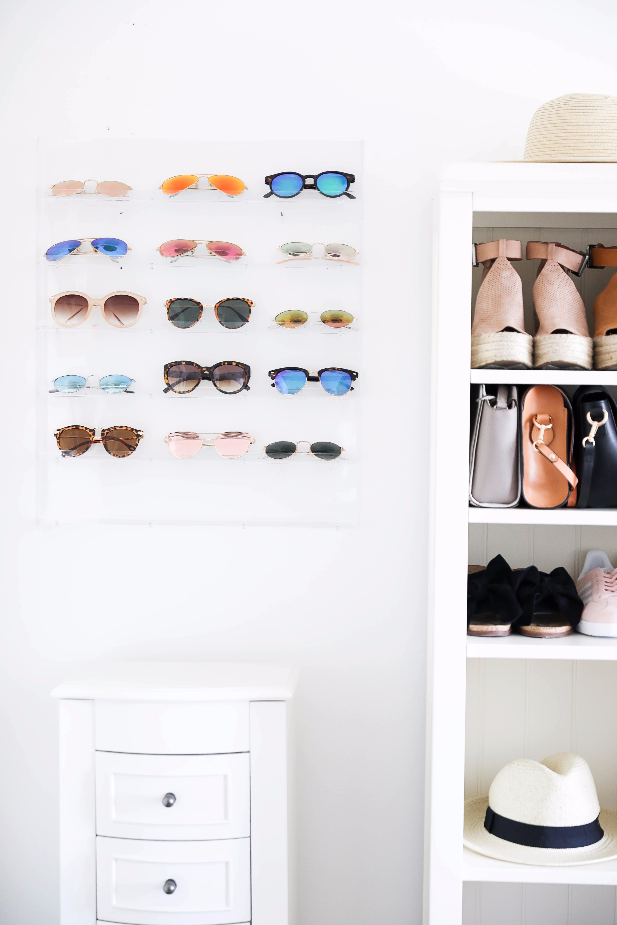 Sunglasses rack June favorites by fashion and lifestyle blogger lauren lindmark on daily dose of charm