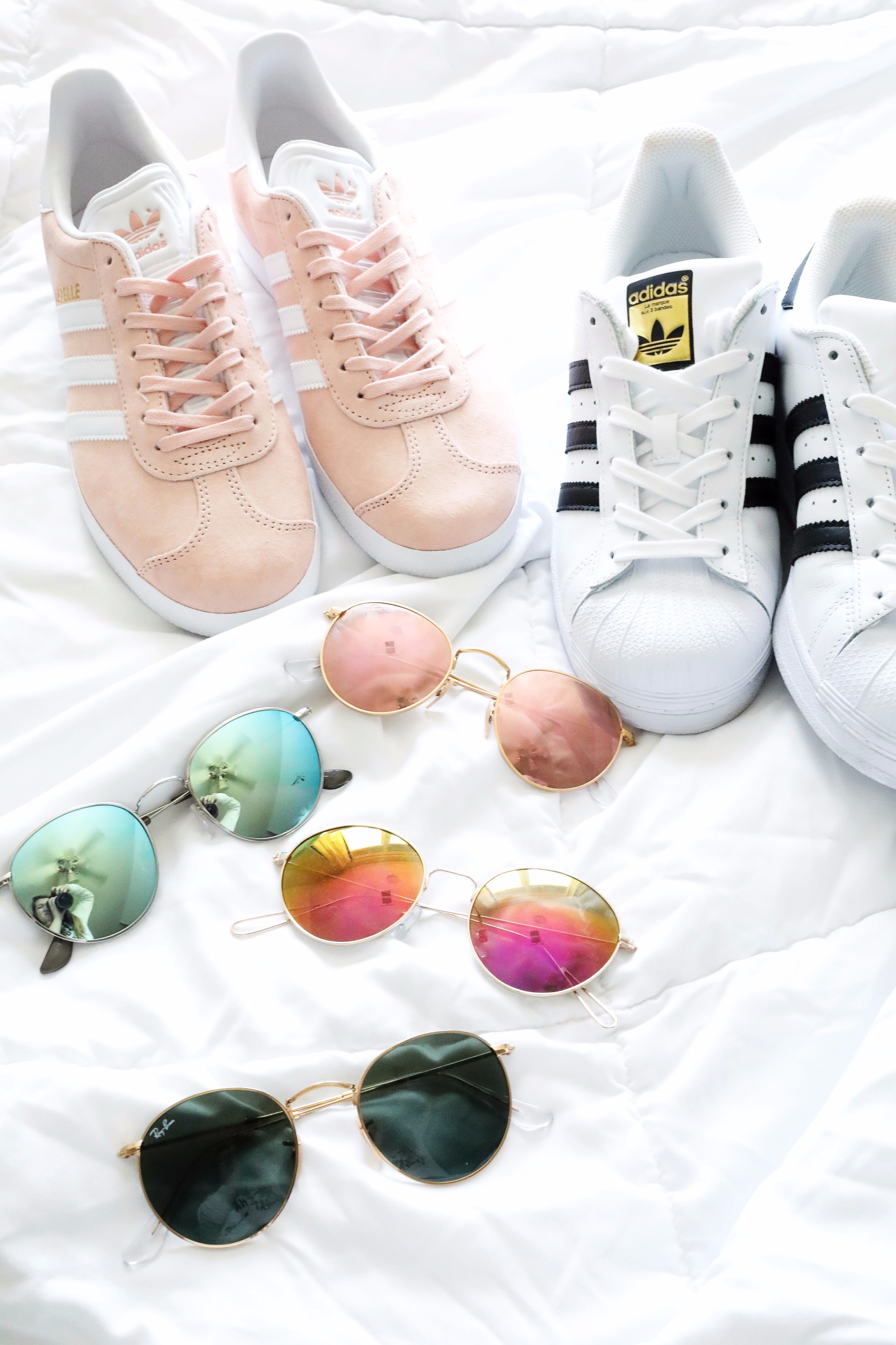 Sunglasses pink Adidas sneakers and my puppy June favorites by fashion and lifestyle blogger lauren lindmark on daily dose of charm