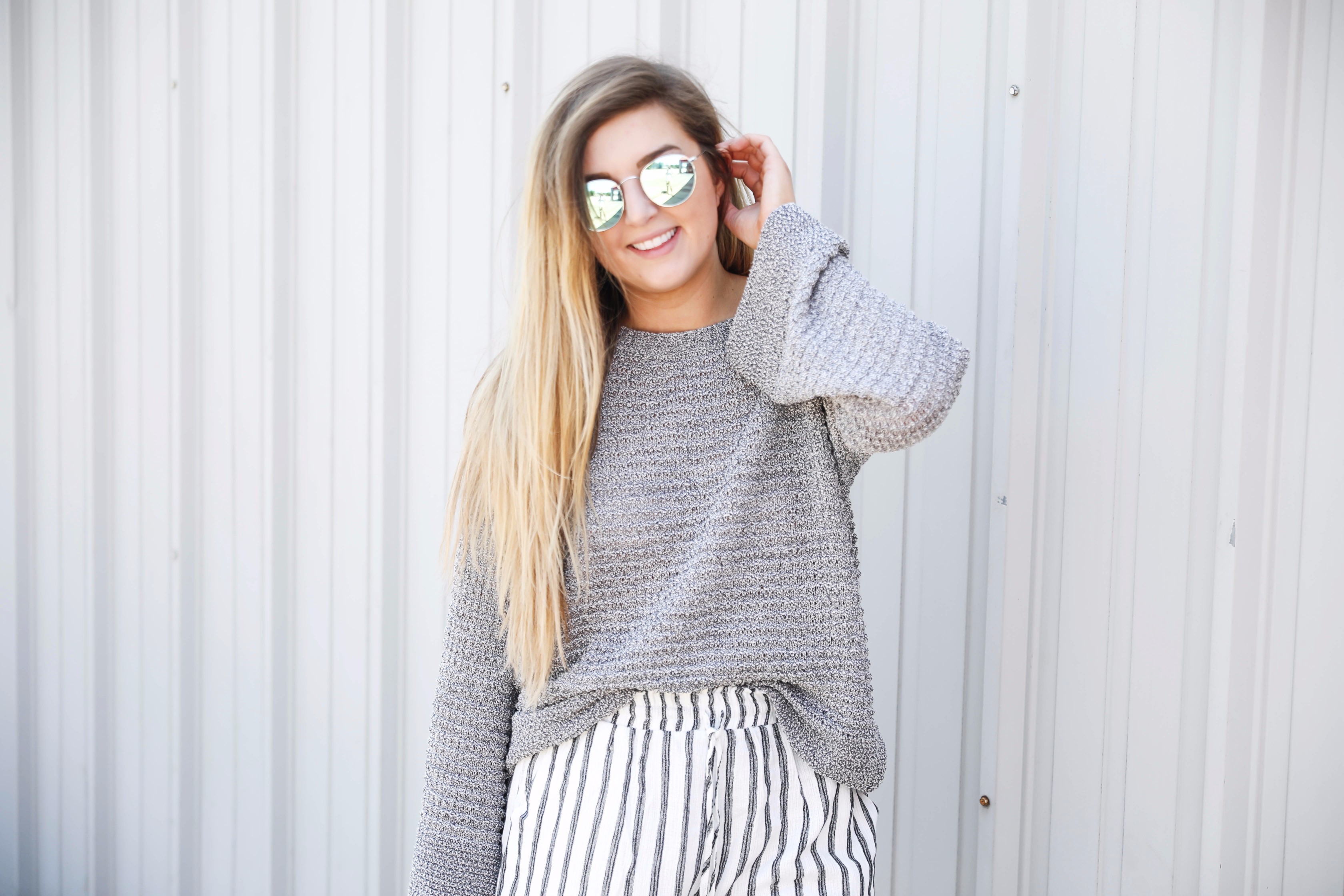 Open back sweater with striped nautical shorts by lauren lindmark on fashion blog daily dose of charm