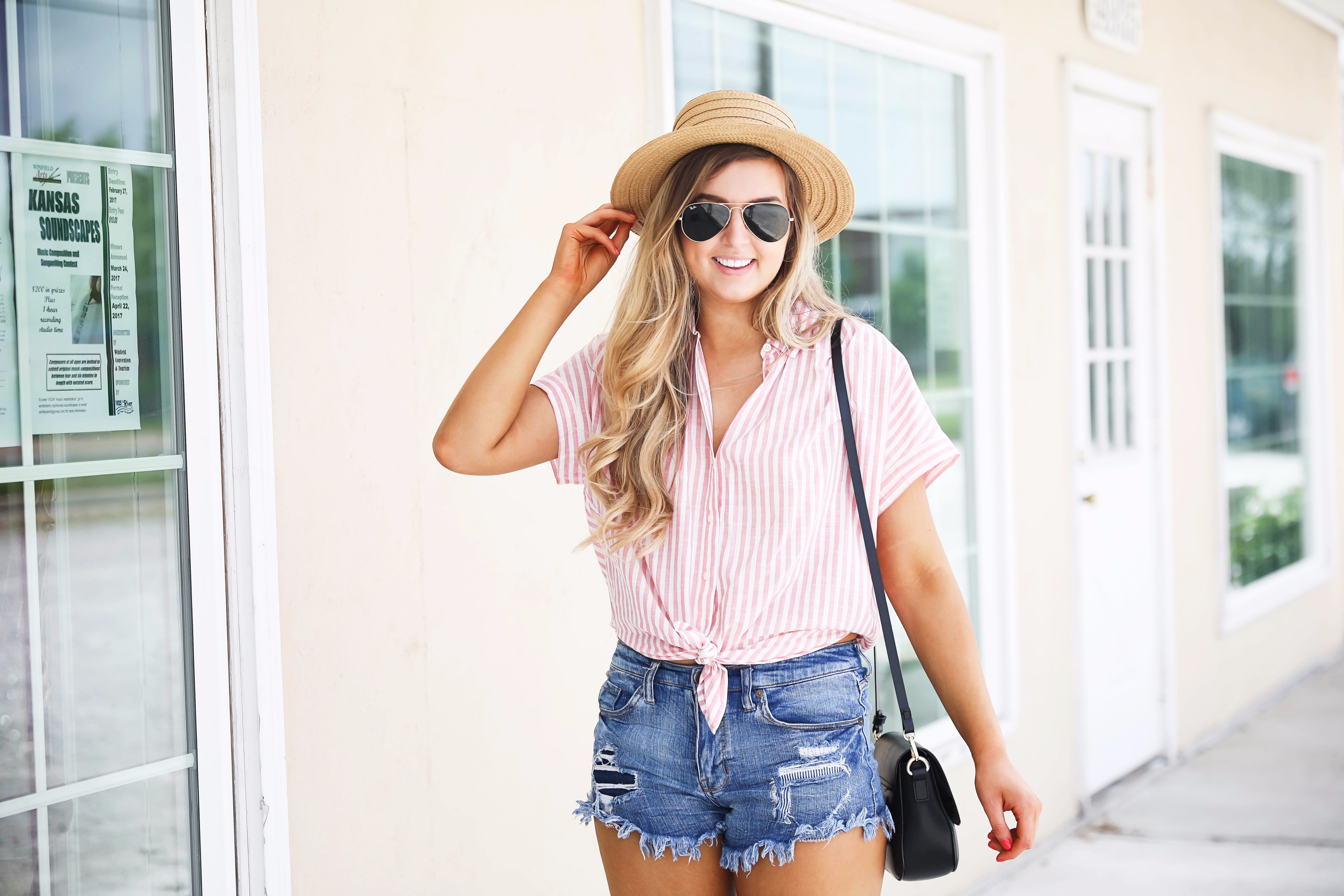 Striped red button up fourth of july outfit with Straw Boater hat by fashion blog daily dose of charm lauren lindmark