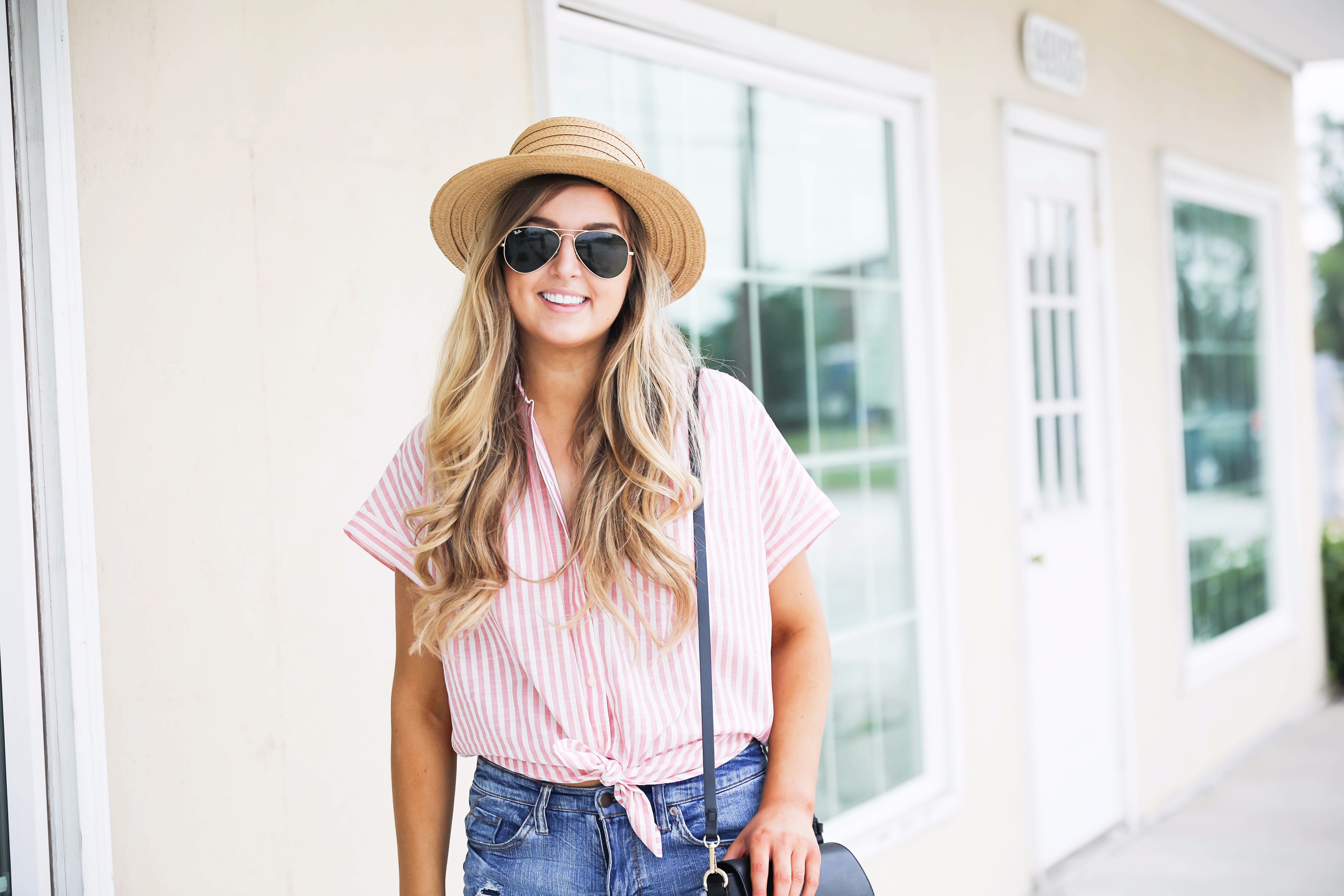 Striped red button up fourth of july outfit with Straw Boater hat by fashion blog daily dose of charm lauren lindmark