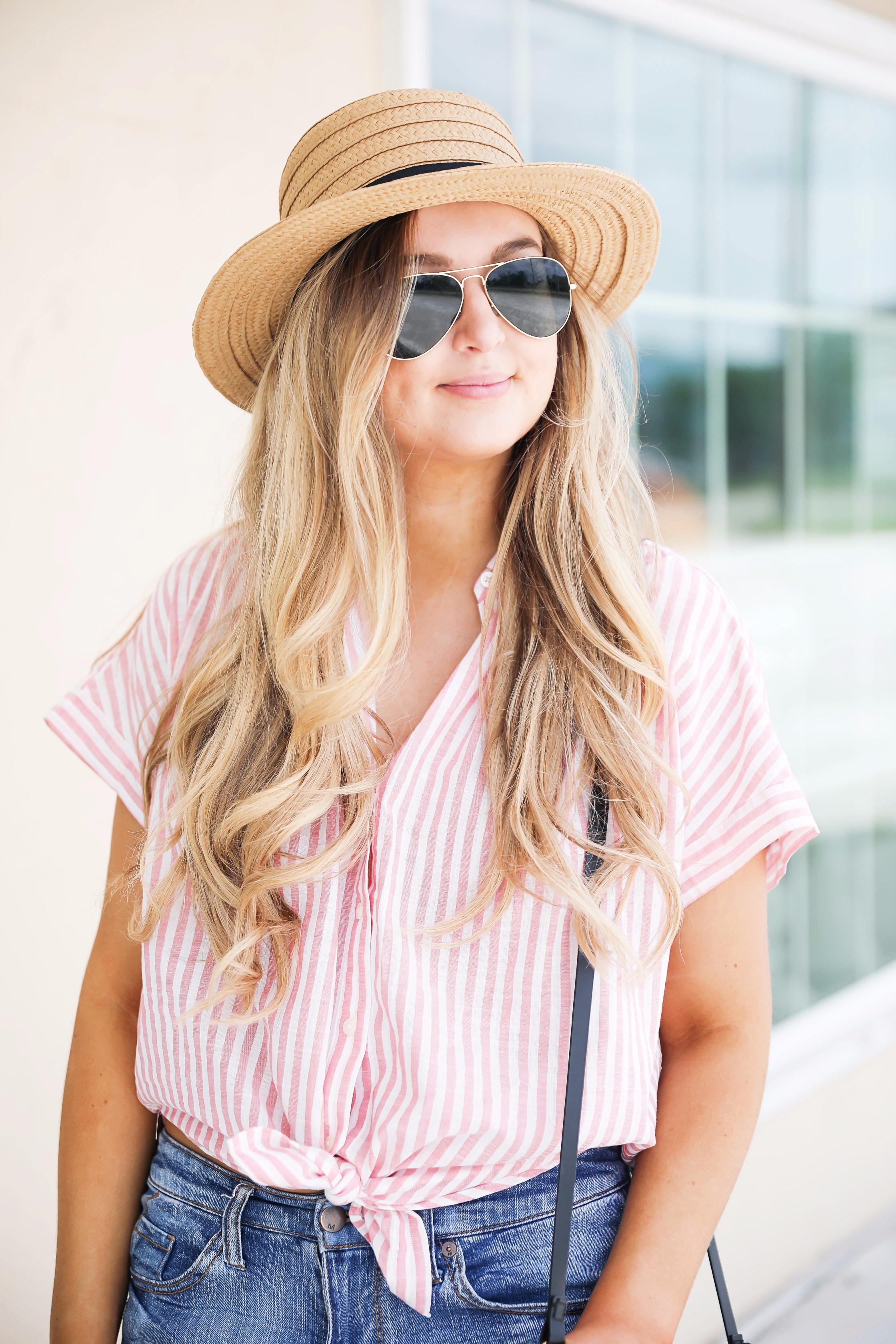 Striped red button up fourth of july outfit with Straw Boater hat by fashion blog daily dose of charm lauren lindmark