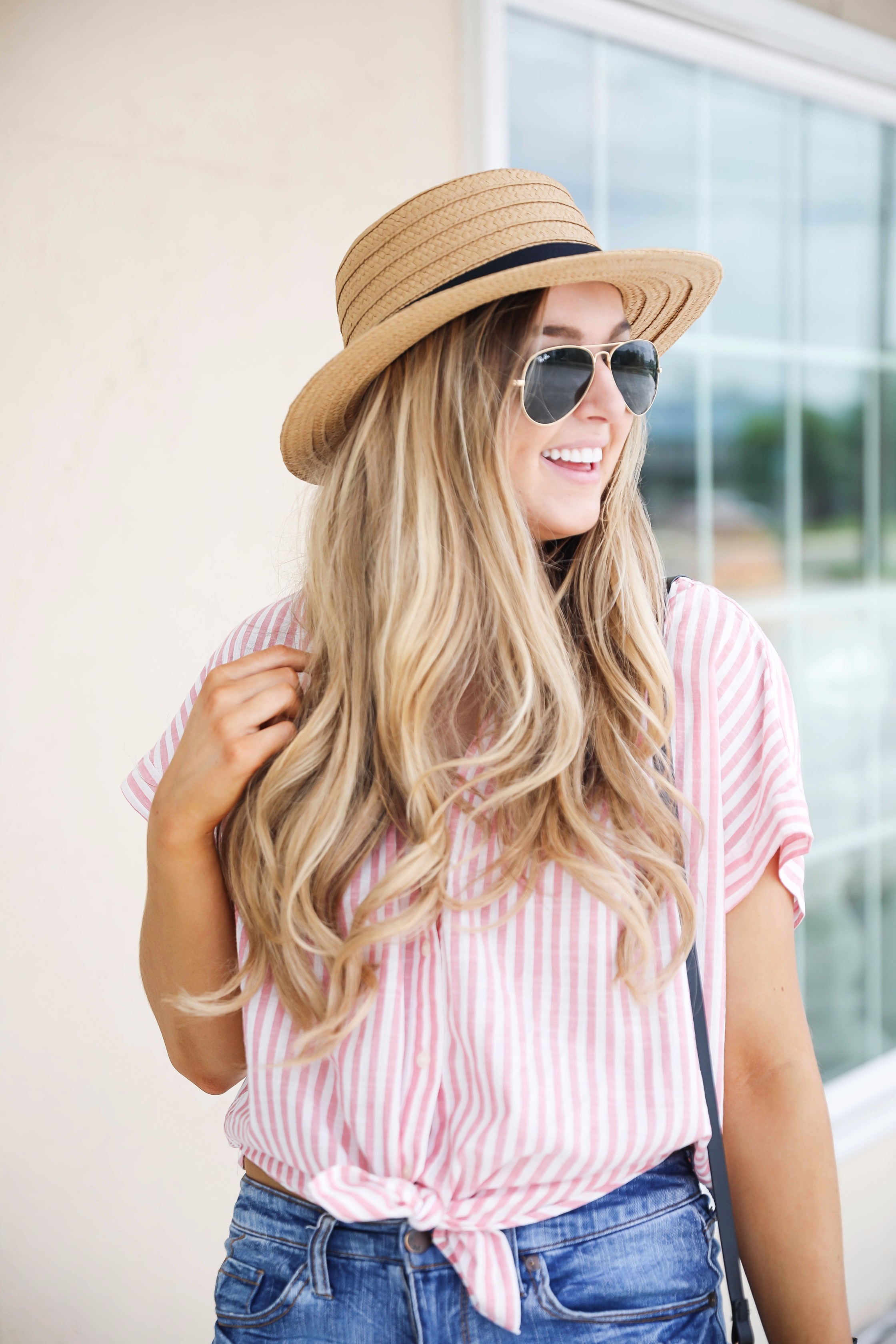 Striped red button up fourth of july outfit with Straw Boater hat by fashion blog daily dose of charm lauren lindmark