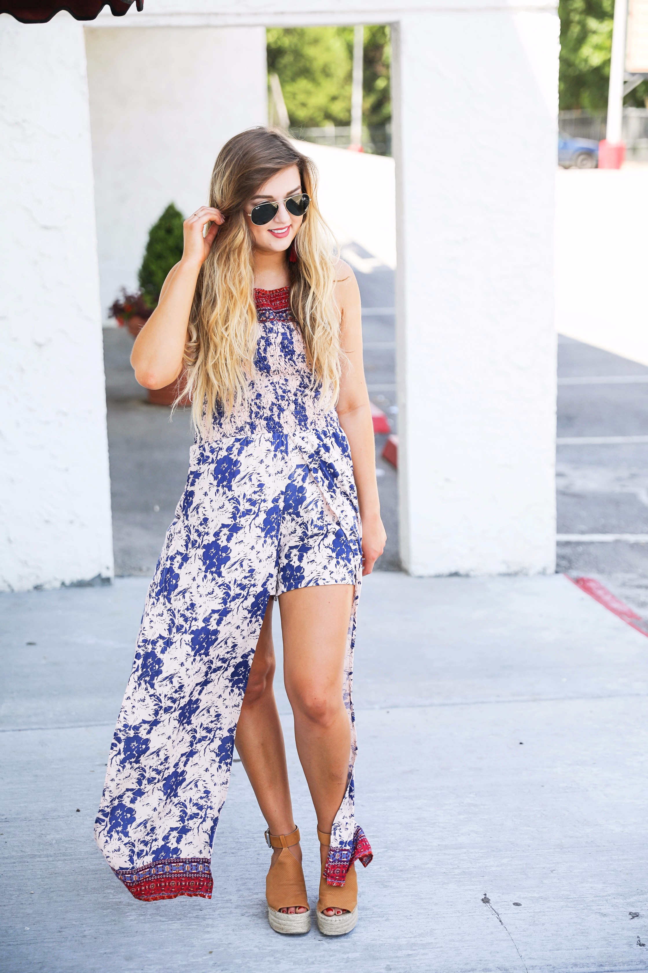 Boho halter romper maxi combo with beachy hair and a bold lip! I also paired these fun burgundy tassel earrings with the look. By fashion blogger lauren lindmakr on daily dose of charm