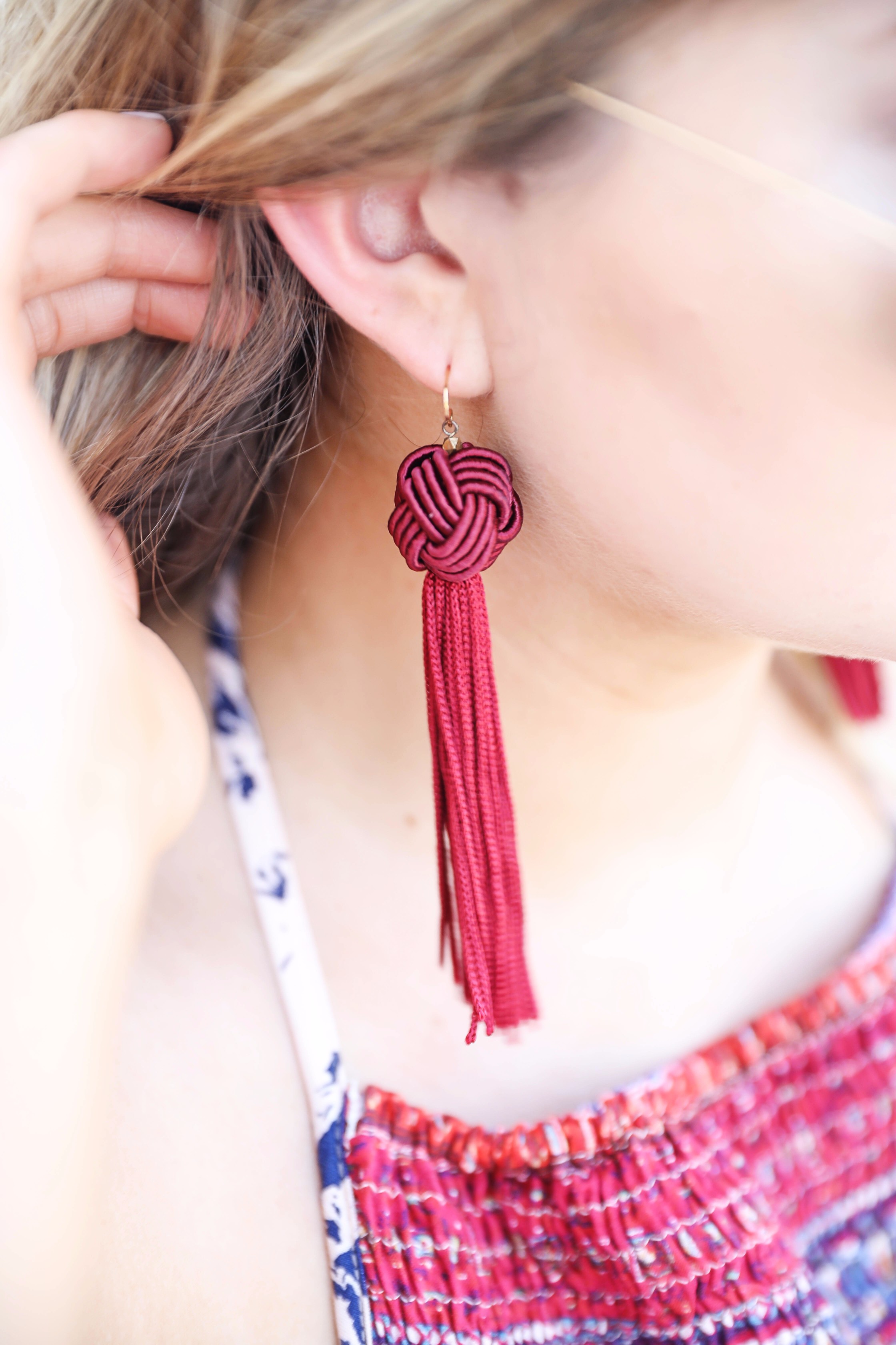 Boho halter romper maxi combo with beachy hair and a bold lip! I also paired these fun burgundy tassel earrings with the look. By fashion blogger lauren lindmakr on daily dose of charm