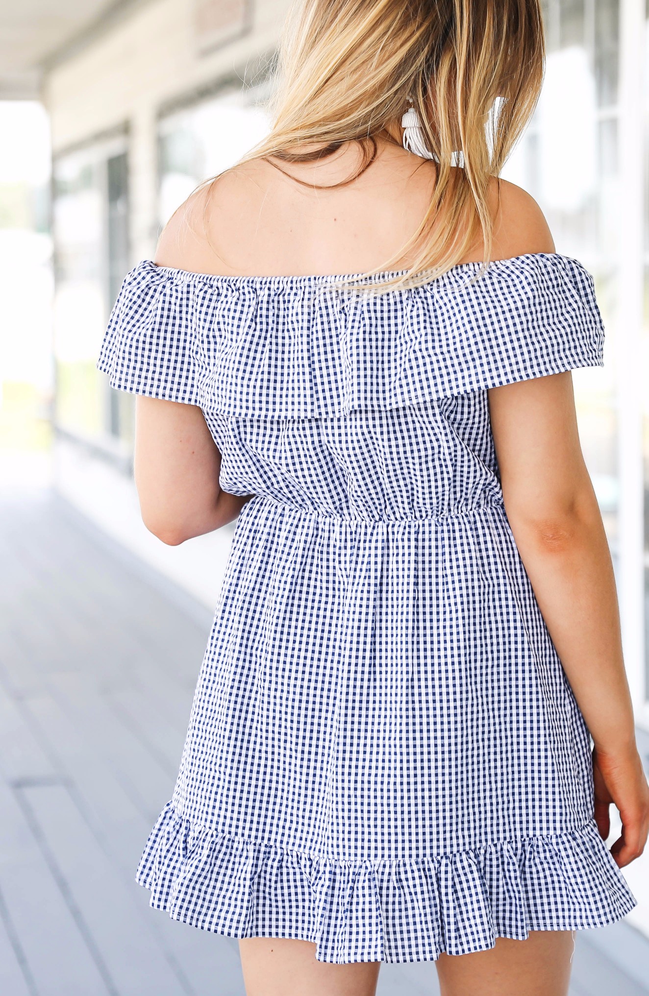 Gingham ruffle dress and round rayb ban sunglasses with tassel earrings on fashion blog daily dose of charm by lauren lindmark