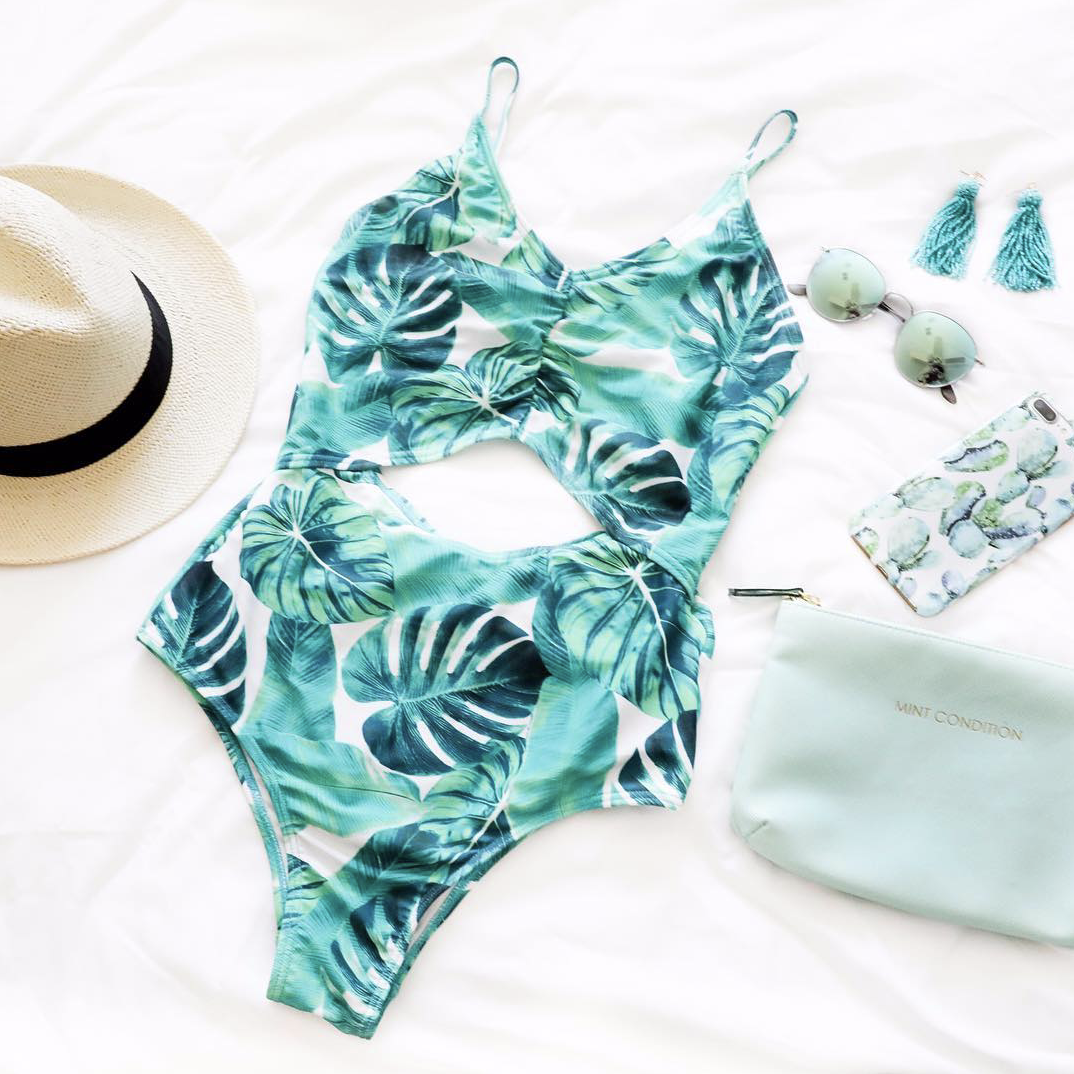 Palm leaf open front one piece from target with cute boat hat, round sunglasses, tassel earrings, phone case, and bag on June Instagram Roundup 2017 on fashion Instagram @dailydoseofcharm by fashion blogger daily dose of charm AKA lauren lindmark