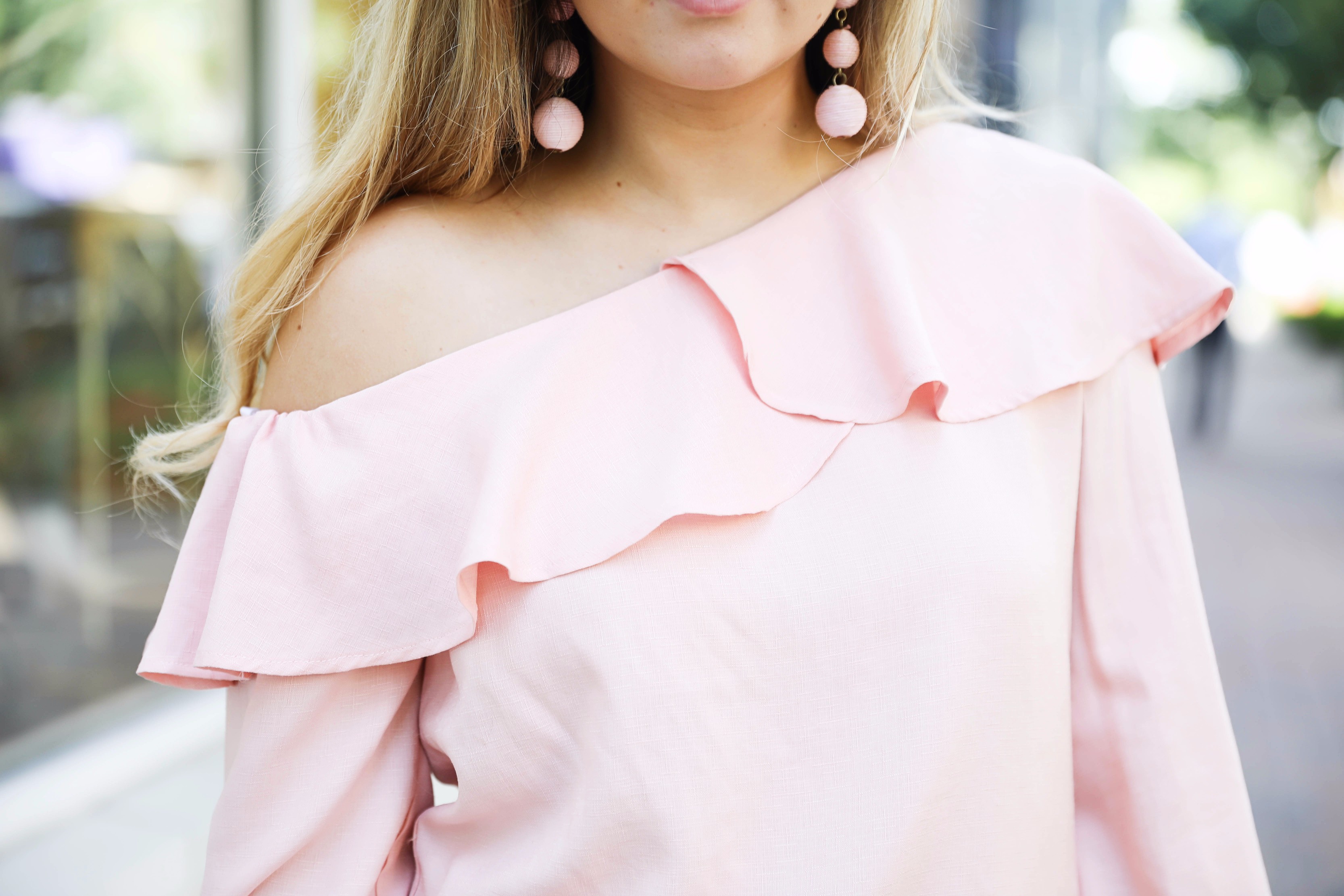 Casual outfit! I love this pink ruffle top with my favorite white sweatshorts that are only $13! On fashion blog daily dose of charm by lauren lindmark