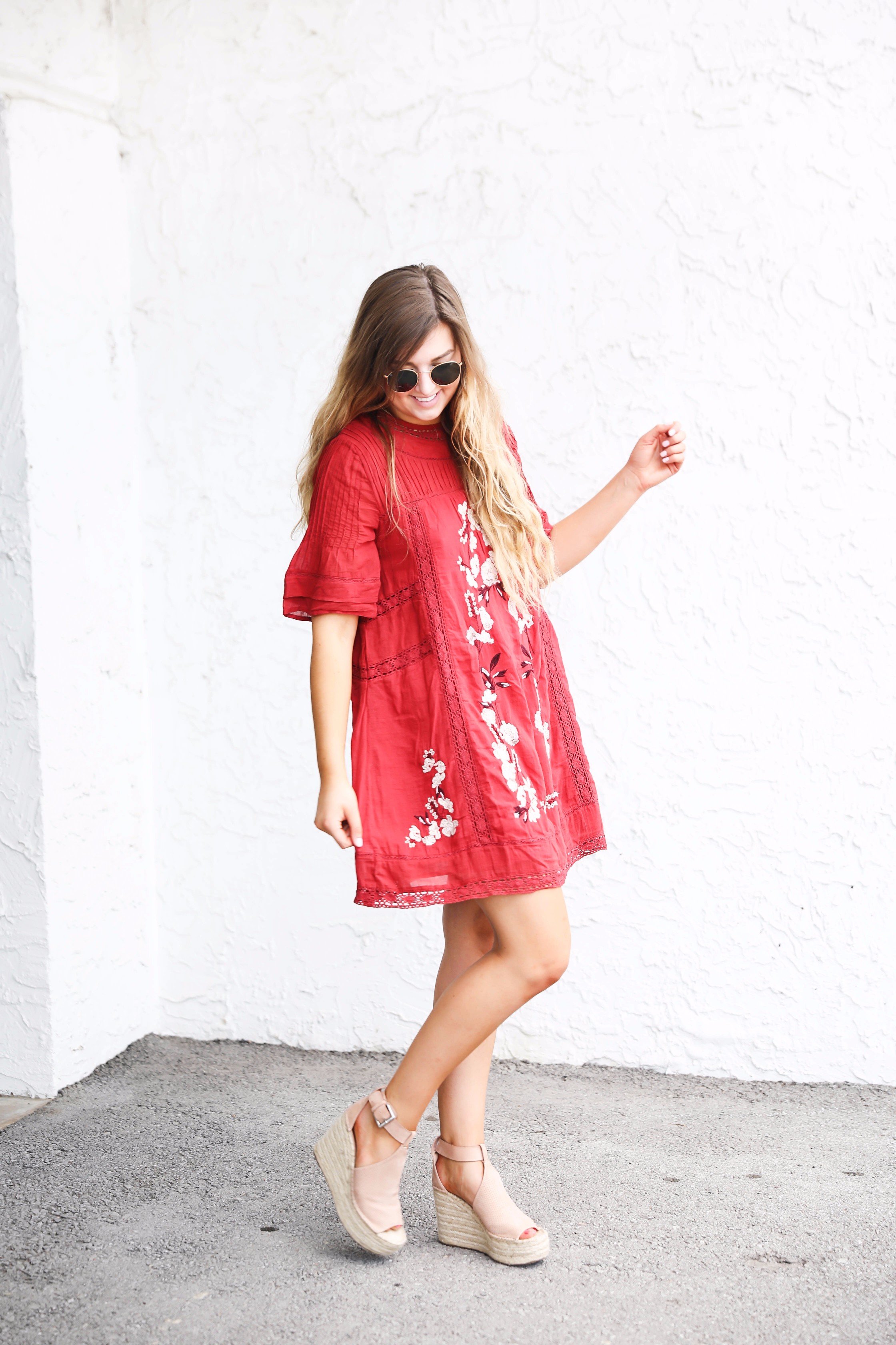 Red free people fall dress! I love this bright red color for fall. There are so many ways to wear this! It would be super cute with boots or booties! by fashion blogger lauren lindmark on daily dose of charm