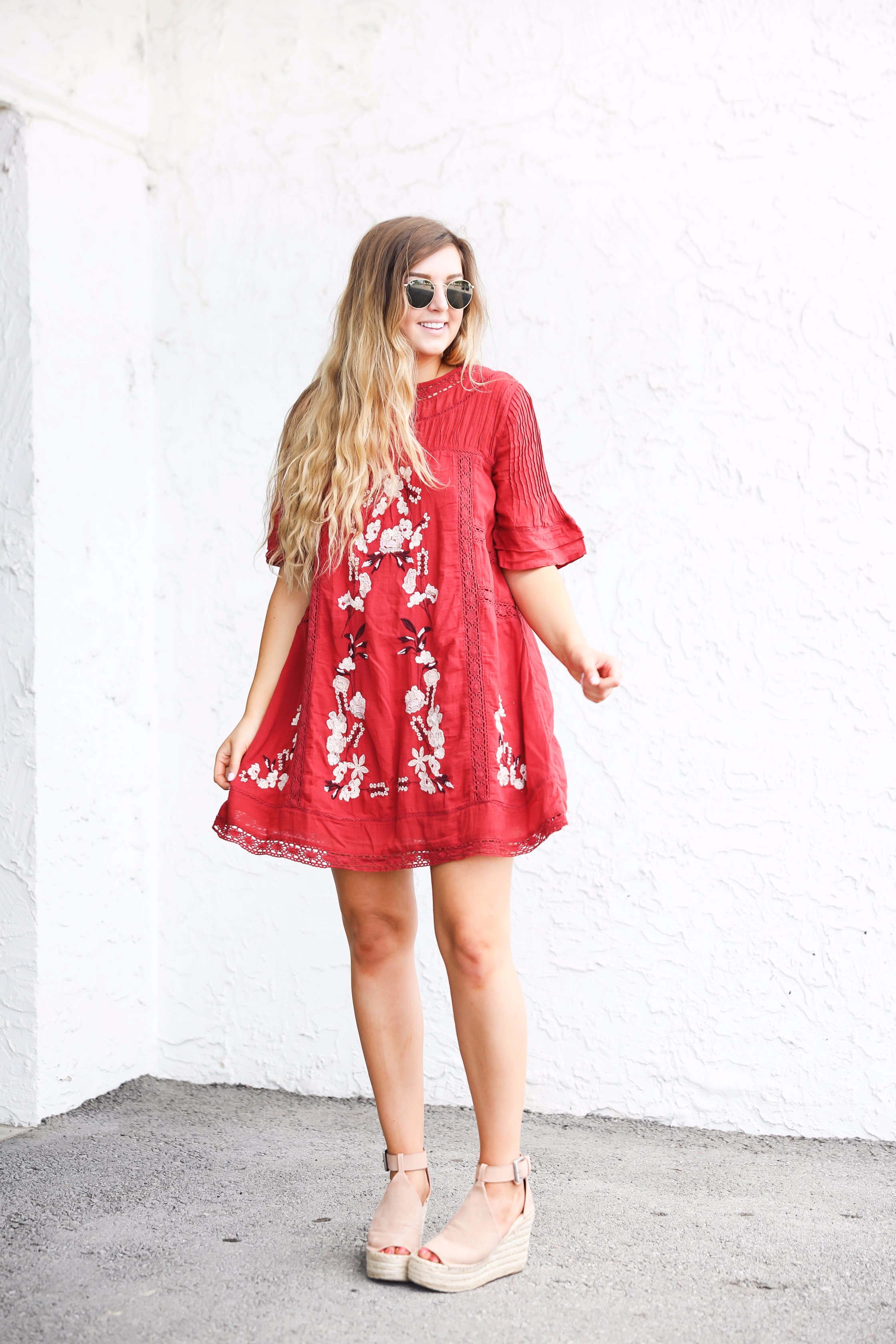 Red free people fall dress! I love this bright red color for fall. There are so many ways to wear this! It would be super cute with boots or booties! by fashion blogger lauren lindmark on daily dose of charm