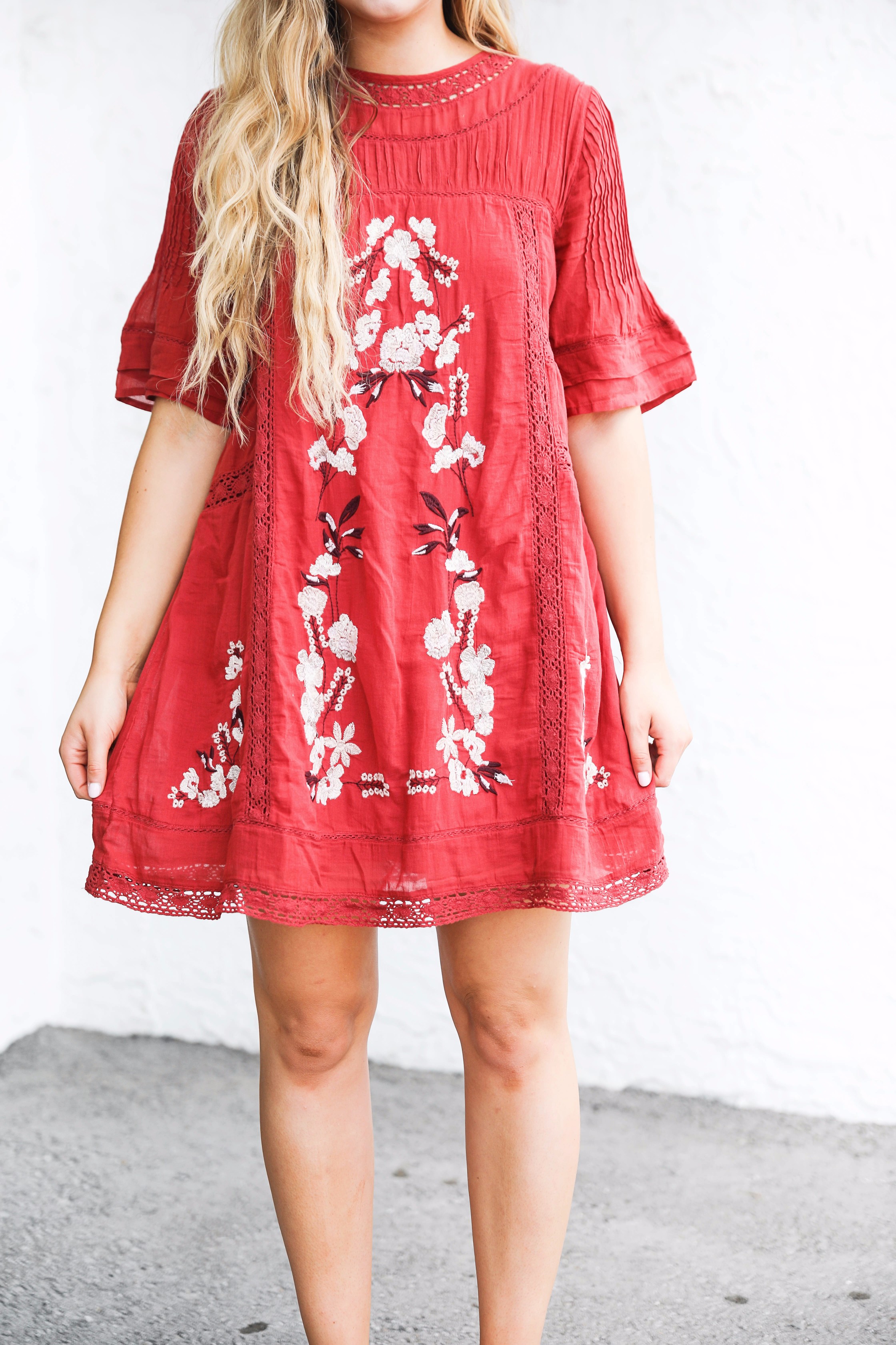 Red free people fall dress! I love this bright red color for fall. There are so many ways to wear this! It would be super cute with boots or booties! by fashion blogger lauren lindmark on daily dose of charm