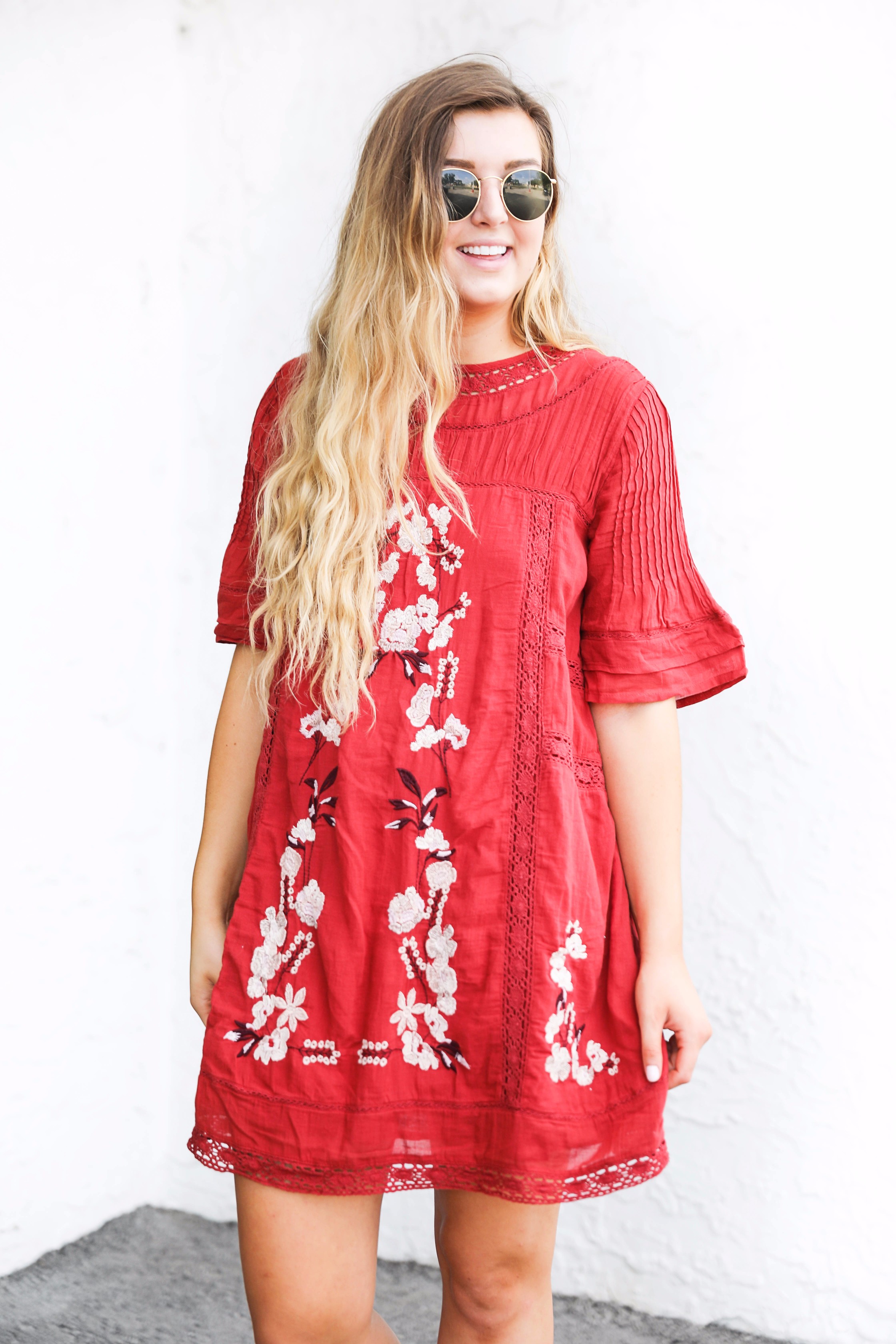 Red free people fall dress! I love this bright red color for fall. There are so many ways to wear this! It would be super cute with boots or booties! by fashion blogger lauren lindmark on daily dose of charm