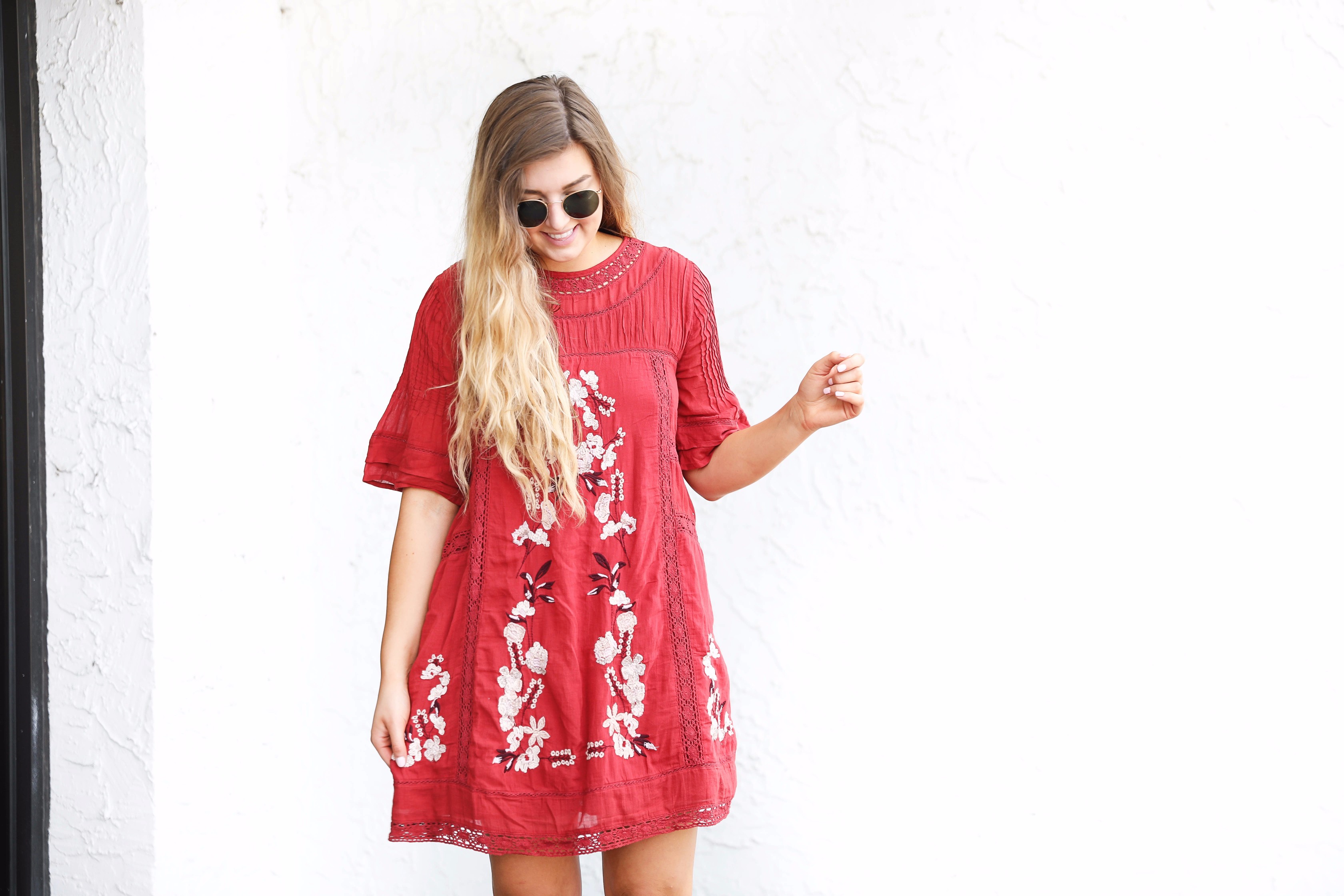 Red free people fall dress! I love this bright red color for fall. There are so many ways to wear this! It would be super cute with boots or booties! by fashion blogger lauren lindmark on daily dose of charm