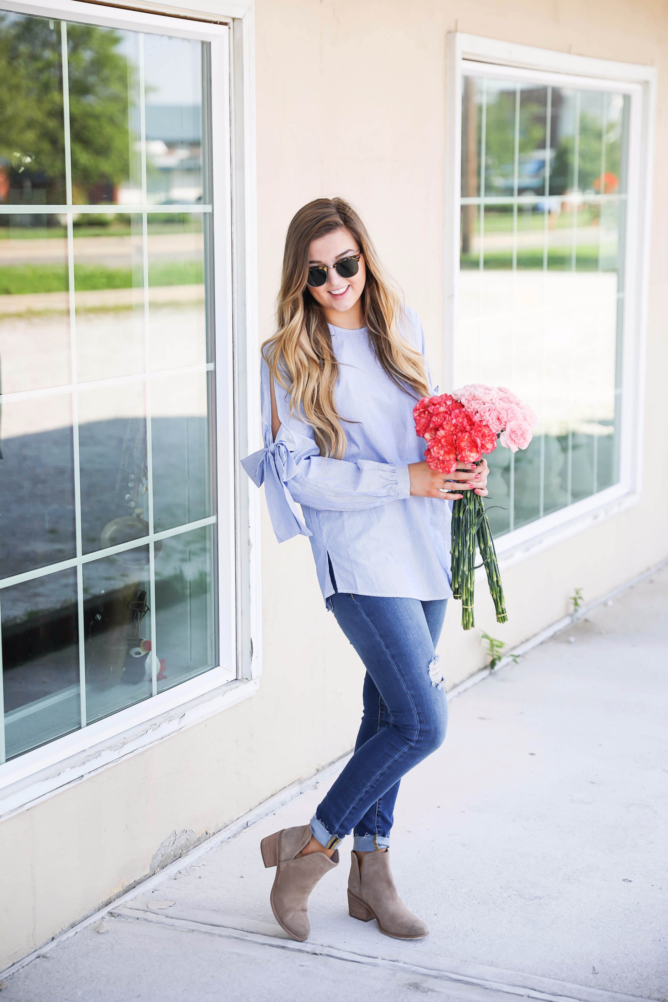 Seersucker bow sleeve cold shoulder top and tape in extensions! The prettiest flowers with the cutest outfit! on fashion blog daily dose of charm by lauren lindmark