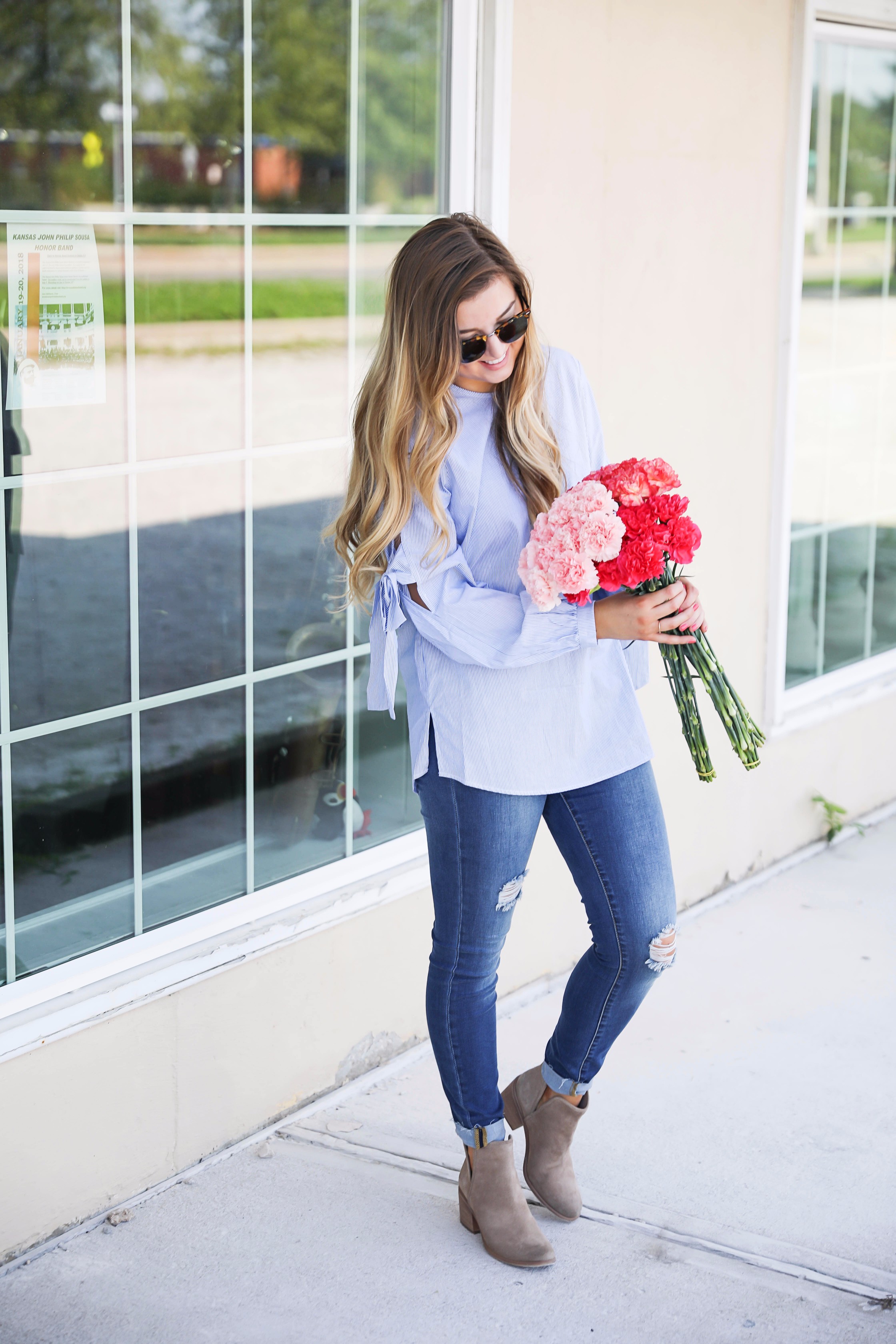 Seersucker bow sleeve cold shoulder top and tape in extensions! The prettiest flowers with the cutest outfit! on fashion blog daily dose of charm by lauren lindmark