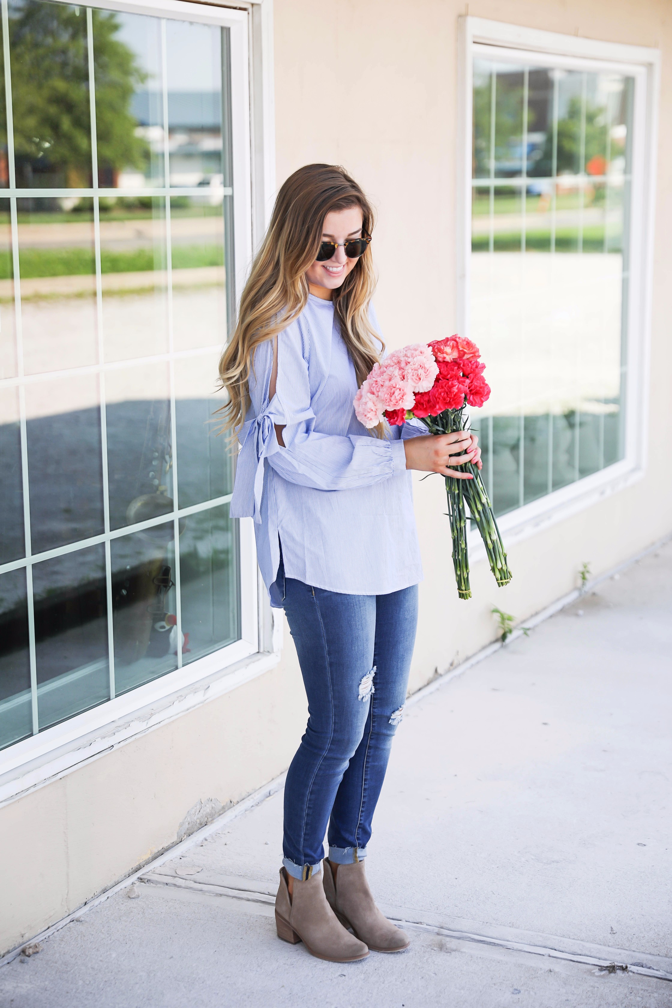 Seersucker bow sleeve cold shoulder top and tape in extensions! The prettiest flowers with the cutest outfit! on fashion blog daily dose of charm by lauren lindmark