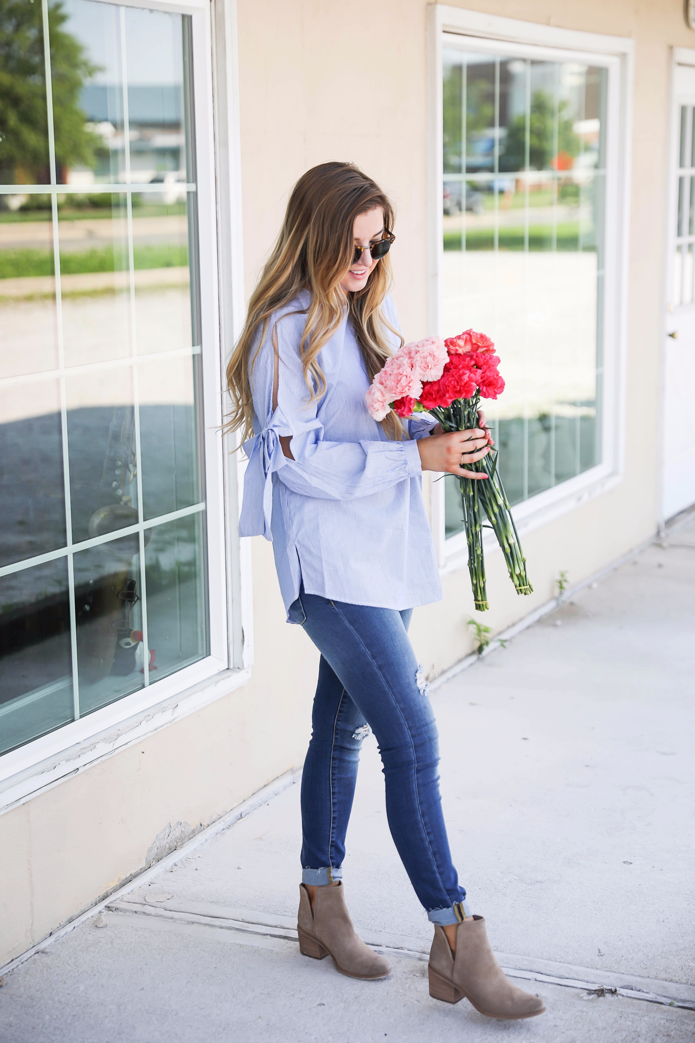 Seersucker bow sleeve cold shoulder top and tape in extensions! The prettiest flowers with the cutest outfit! on fashion blog daily dose of charm by lauren lindmark