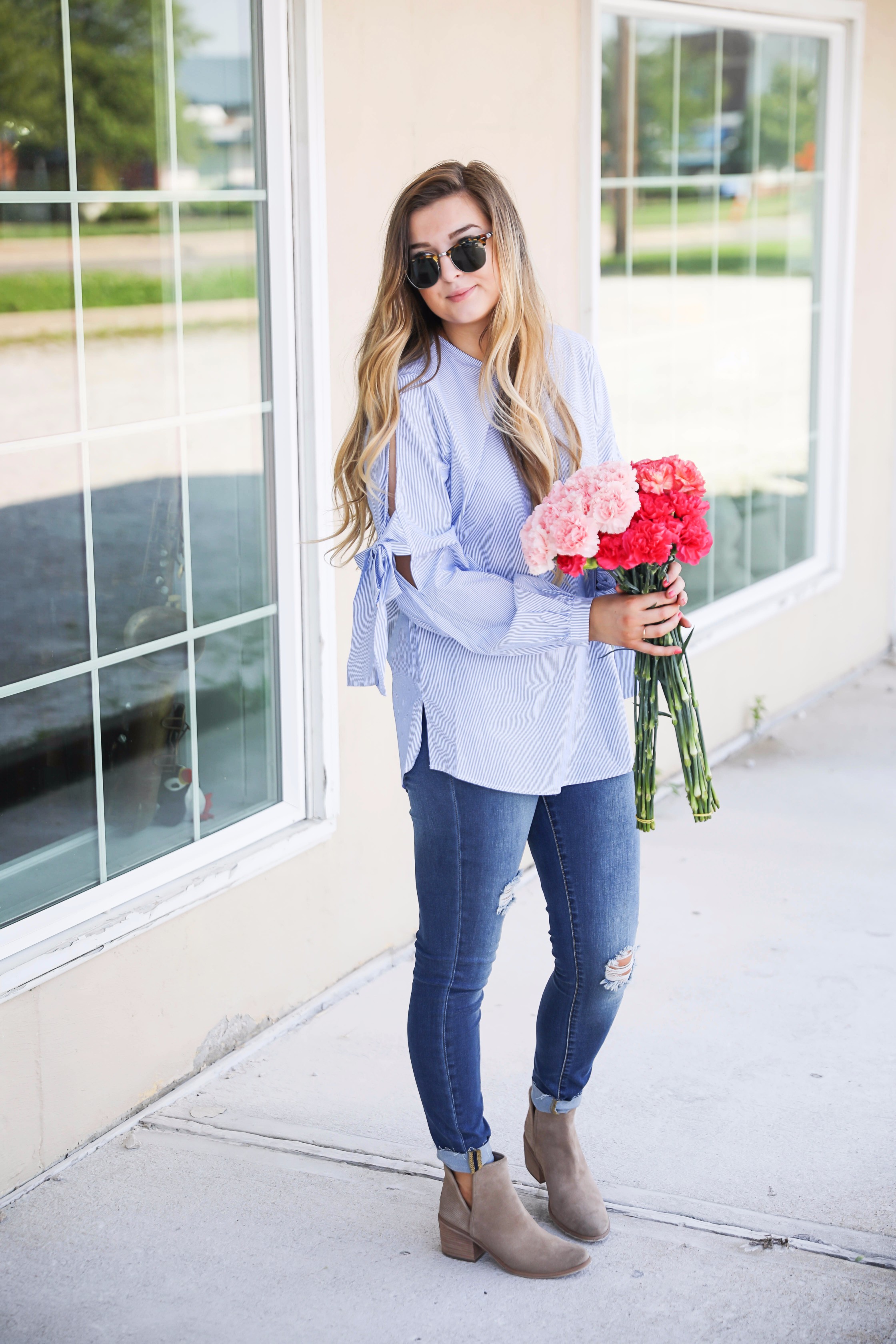 Seersucker bow sleeve cold shoulder top and tape in extensions! The prettiest flowers with the cutest outfit! on fashion blog daily dose of charm by lauren lindmark