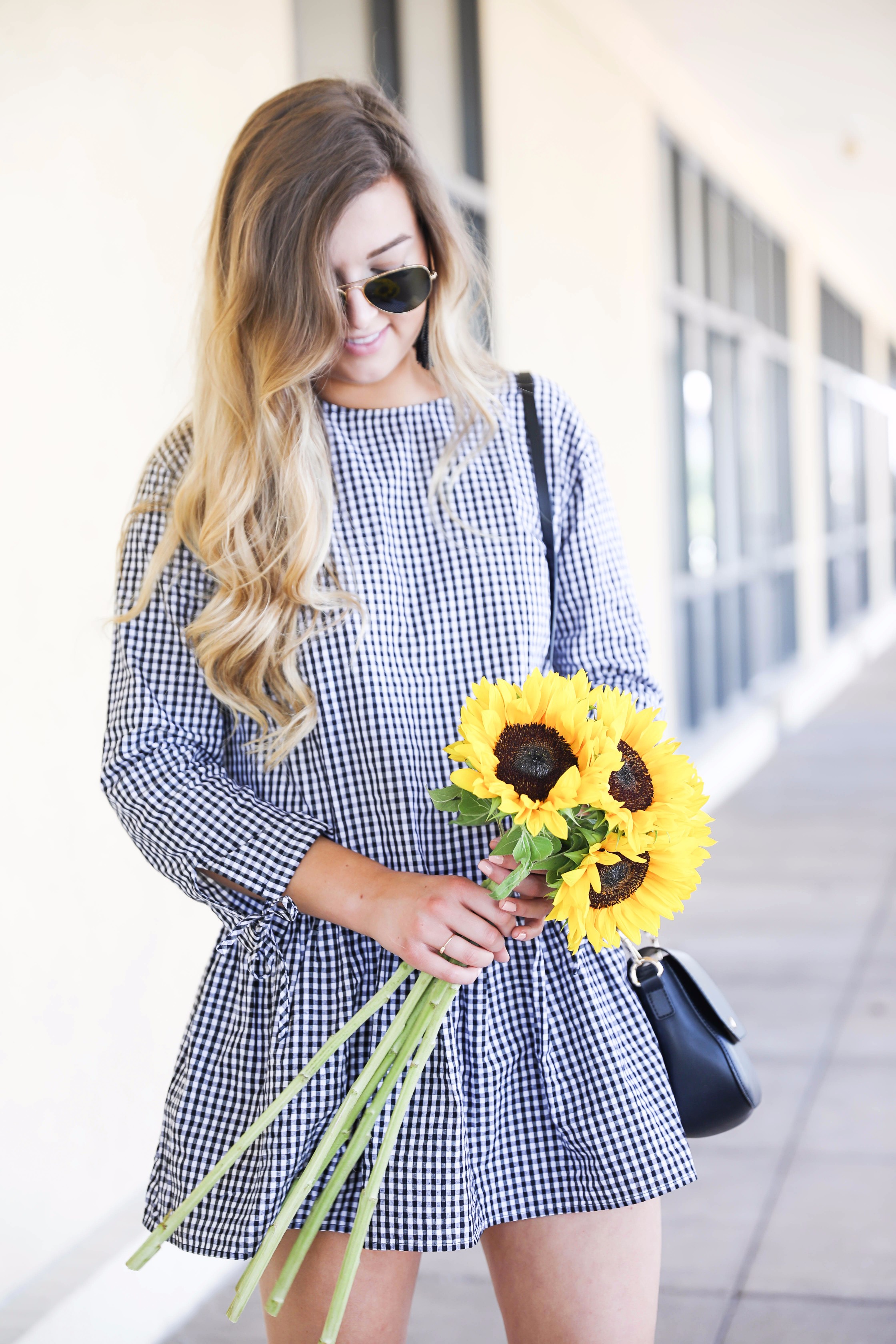 Sunflowers and gingham! The cutest low waist dress for summer transiting into fall. I can't get enough of this cute gingham dress! More details on fashion blog daily dose of charm by lauren lindmark