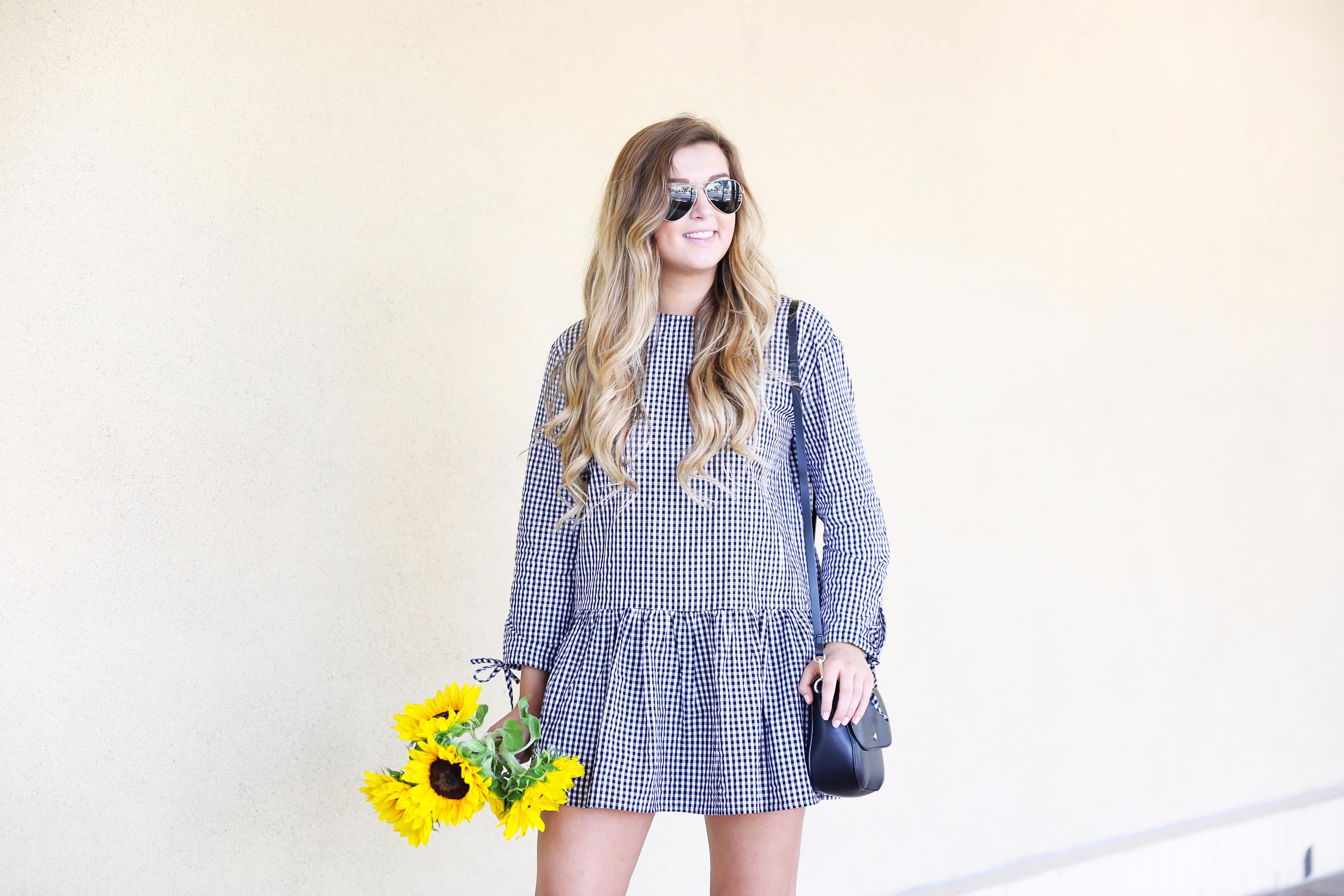 Sunflowers and gingham! The cutest low waist dress for summer transiting into fall. I can't get enough of this cute gingham dress! More details on fashion blog daily dose of charm by lauren lindmark