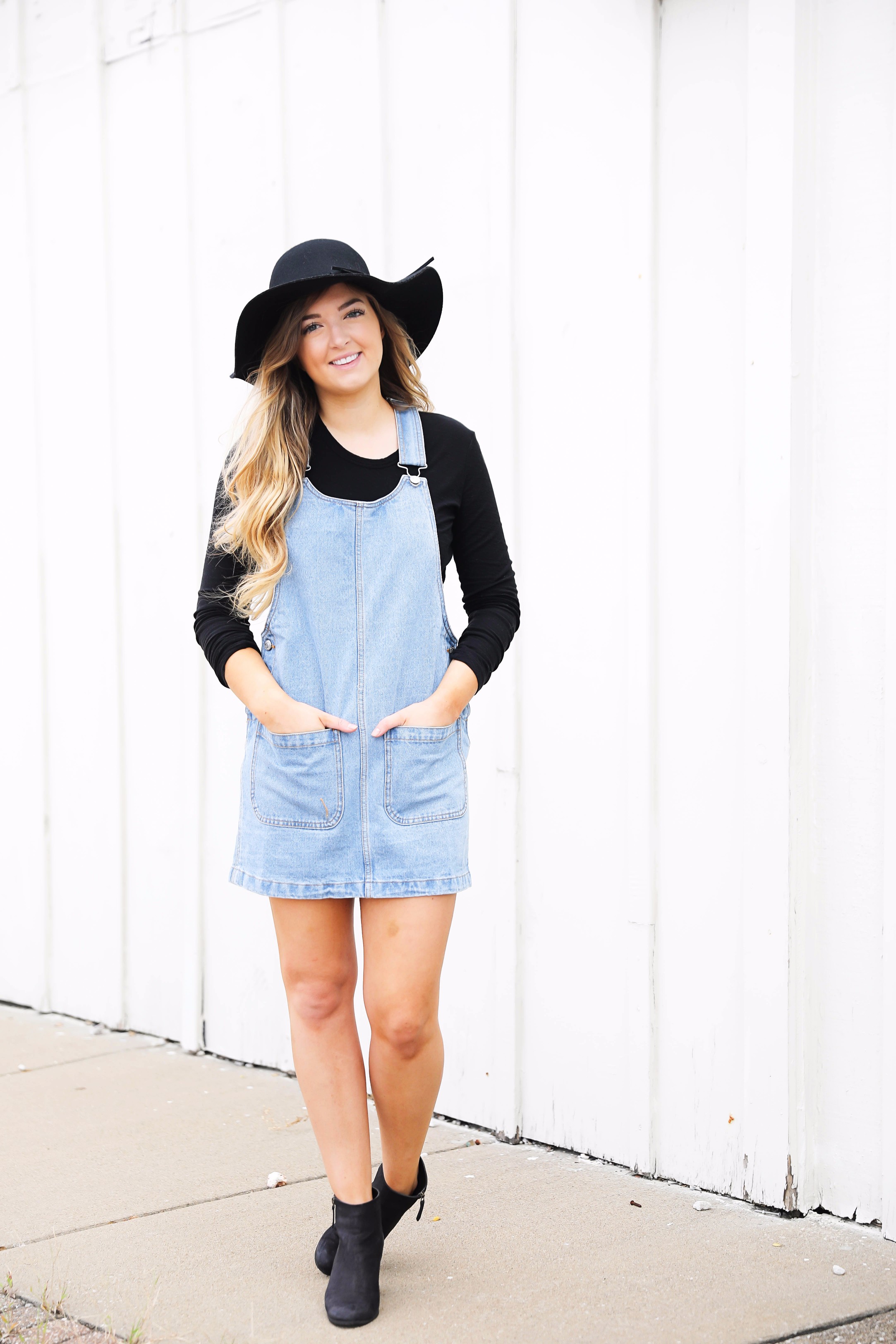 Fall outfit idea! Overall dress and black floppy hat and black booties! I love this look! Find the details on fashion blog daily dose of charm by lauren lindmark