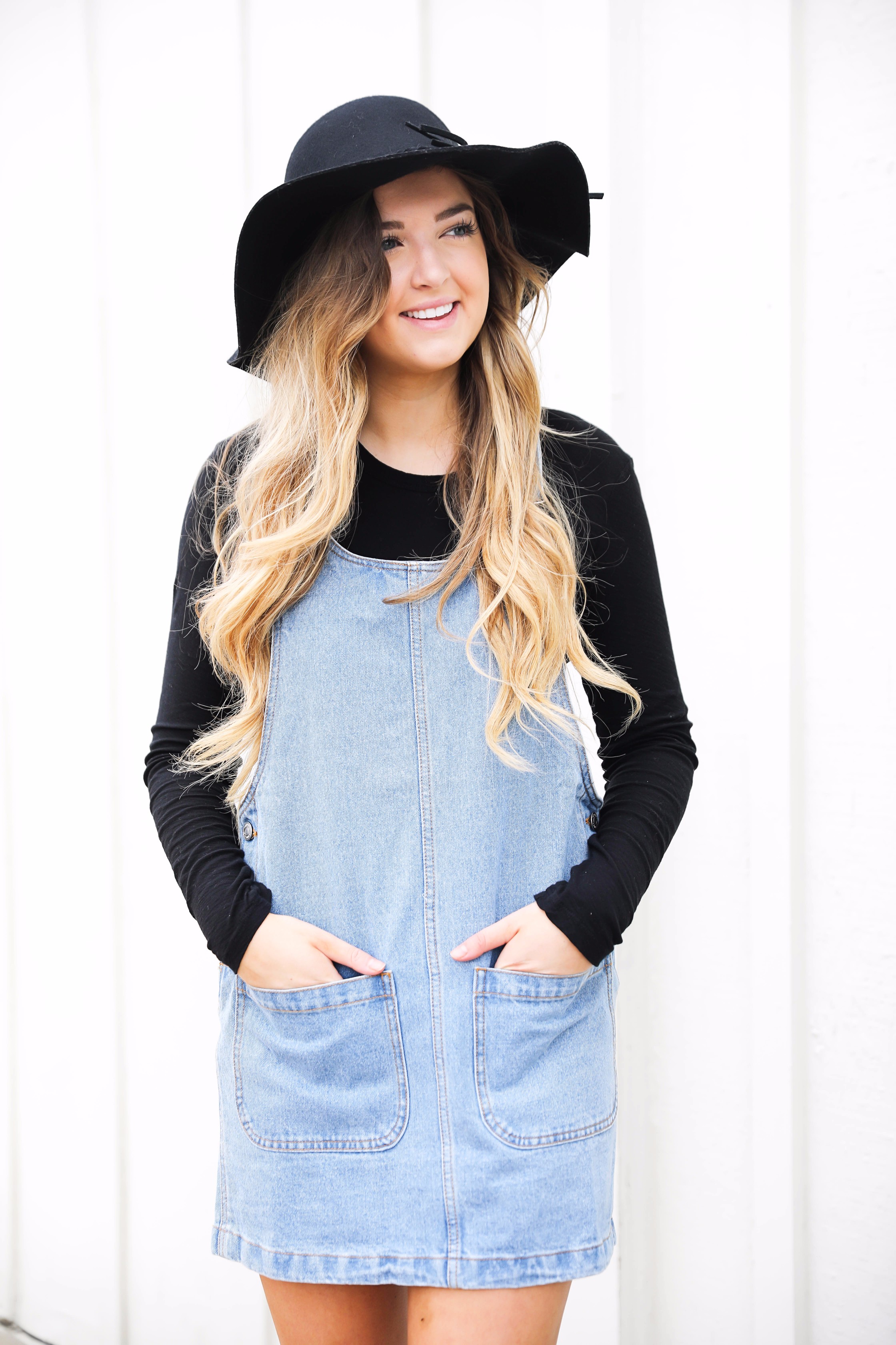 Fall outfit idea! Overall dress and black floppy hat and black booties! I love this look! Find the details on fashion blog daily dose of charm by lauren lindmark