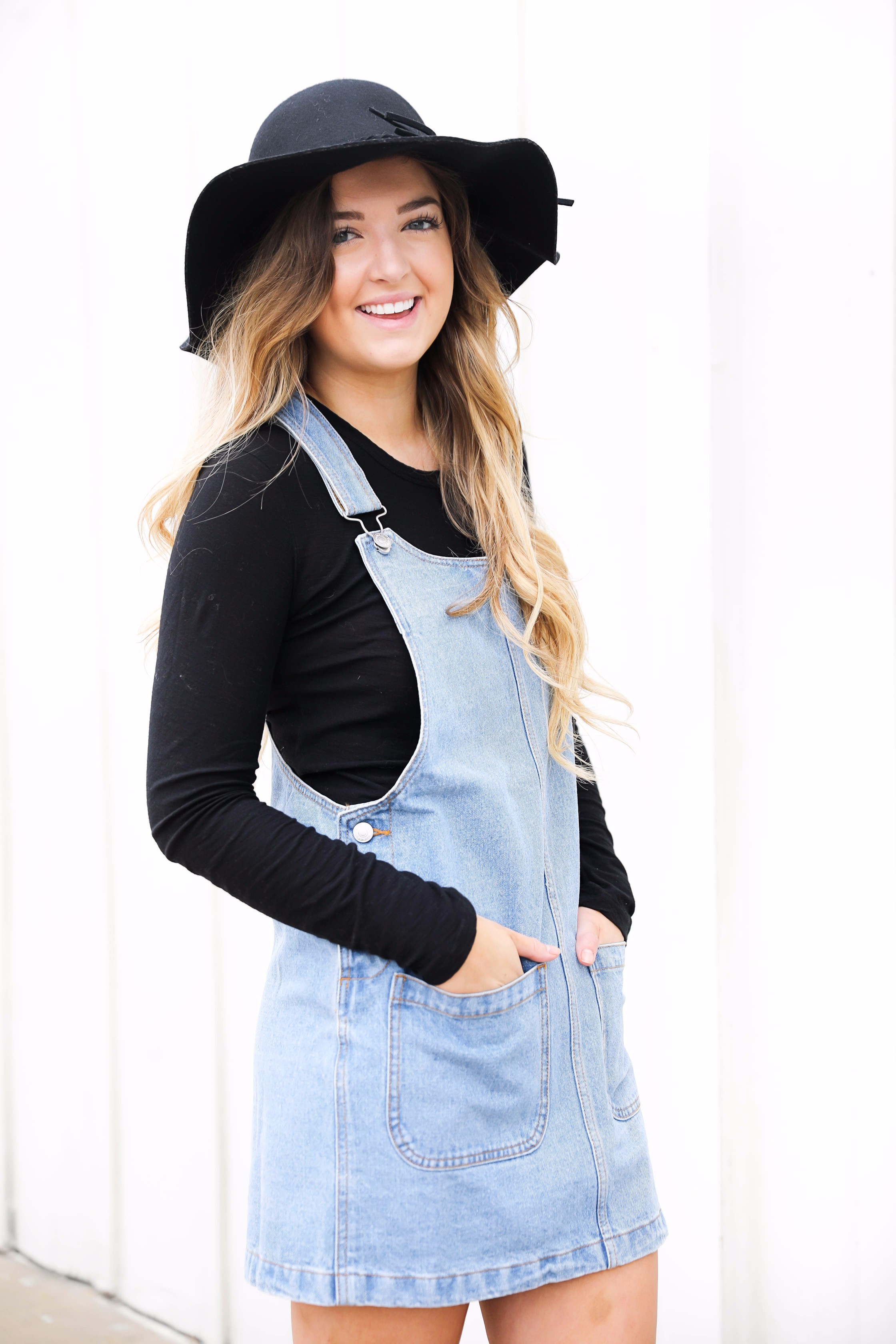 Fall outfit idea! Overall dress and black floppy hat and black booties! I love this look! Find the details on fashion blog daily dose of charm by lauren lindmark