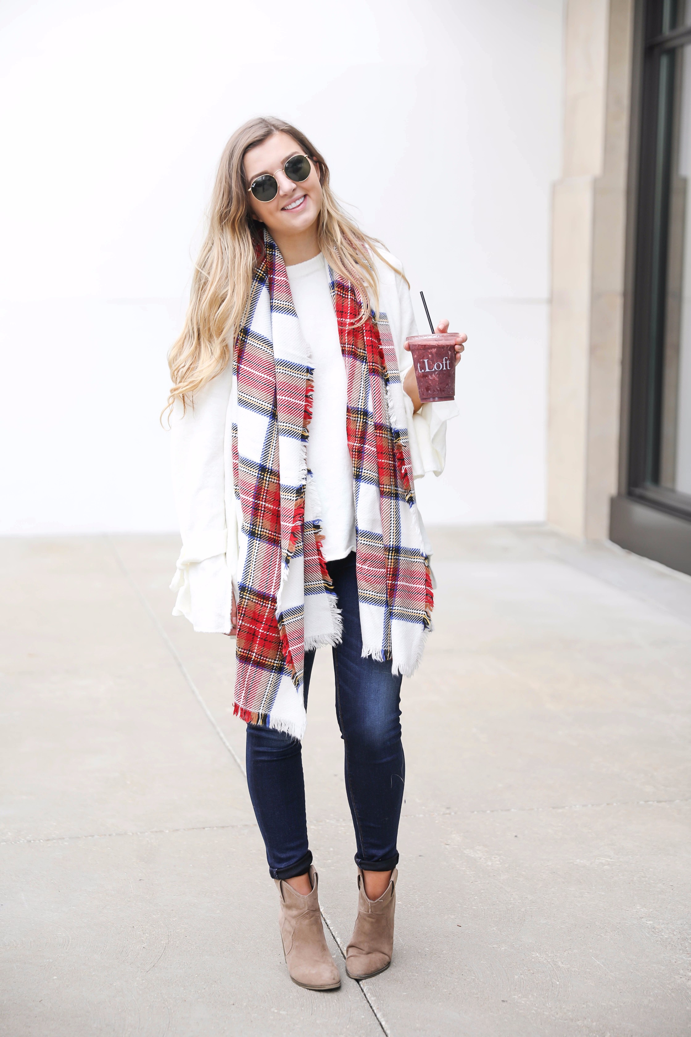 Tied bow sleeve sweater with a plaid blanket scarf! I love blanket scarves for fall. This outfit is perfect with dark jeans and booties! Details on fashion blog daily dose of charm by lauren lindmark