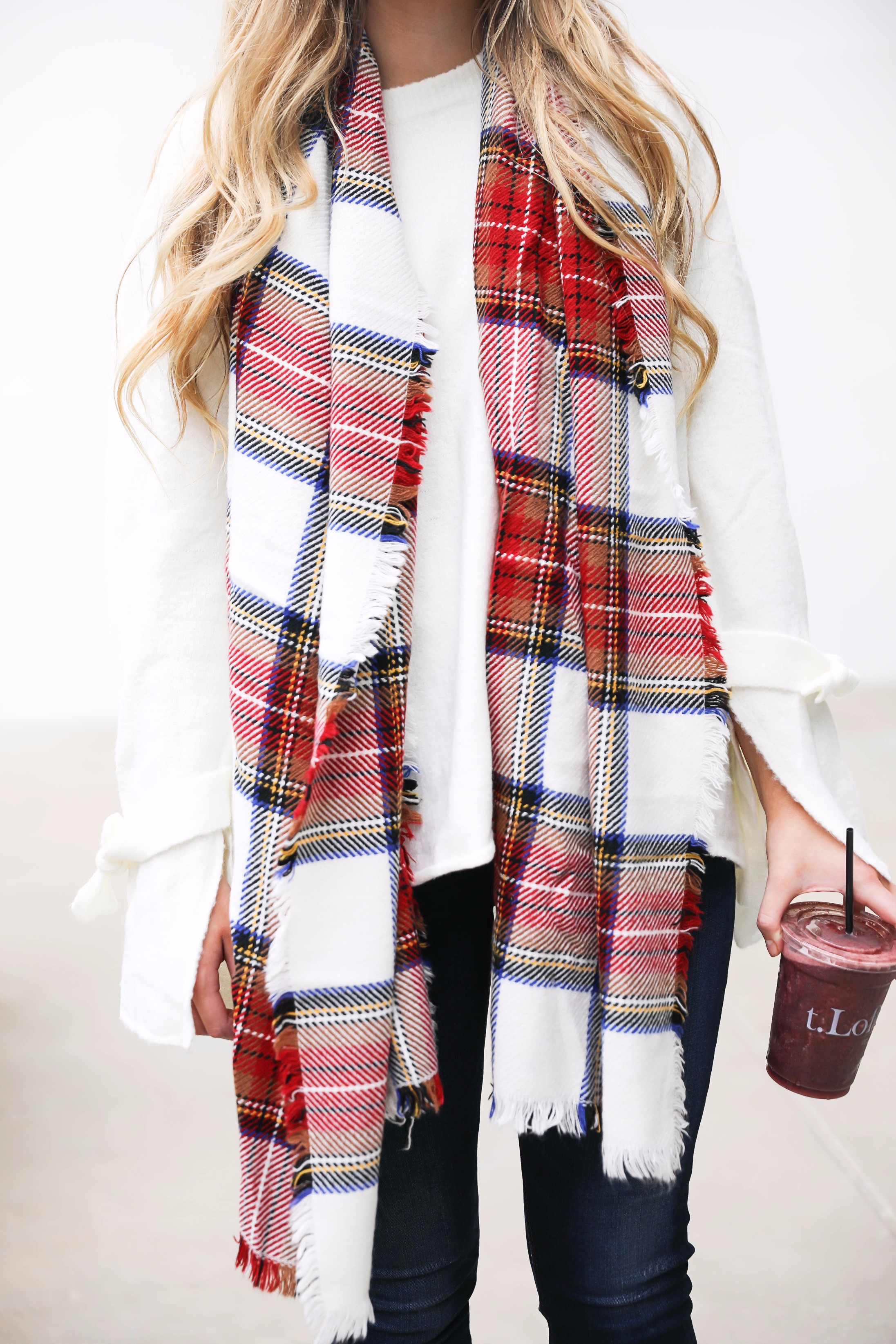 Tied bow sleeve sweater with a plaid blanket scarf! I love blanket scarves for fall. This outfit is perfect with dark jeans and booties! Details on fashion blog daily dose of charm by lauren lindmark