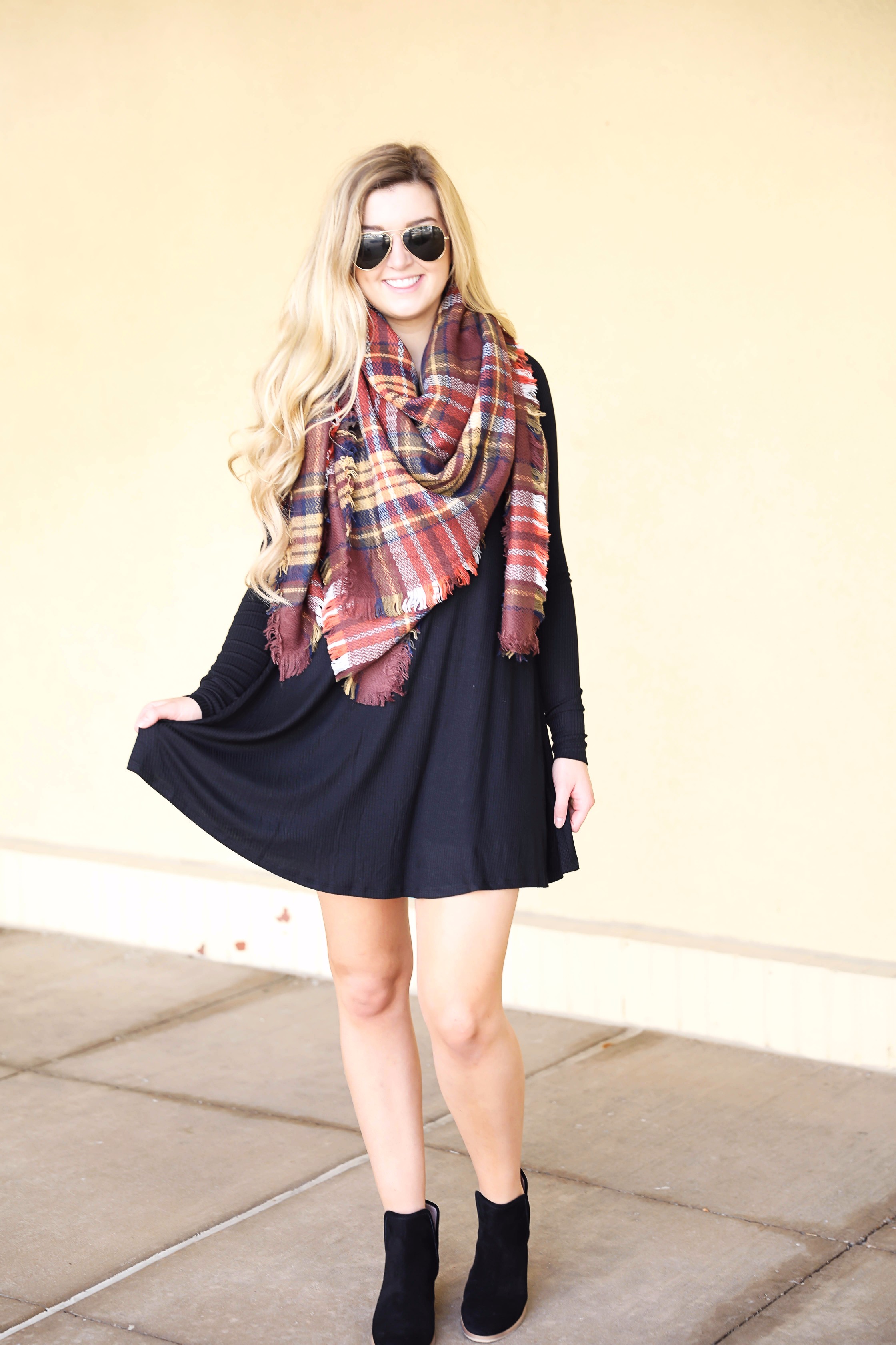 Plaid blanket scarf by ILY Mix paired with a cute black long sleeve dress and booties on fashion blog daily dose of charm