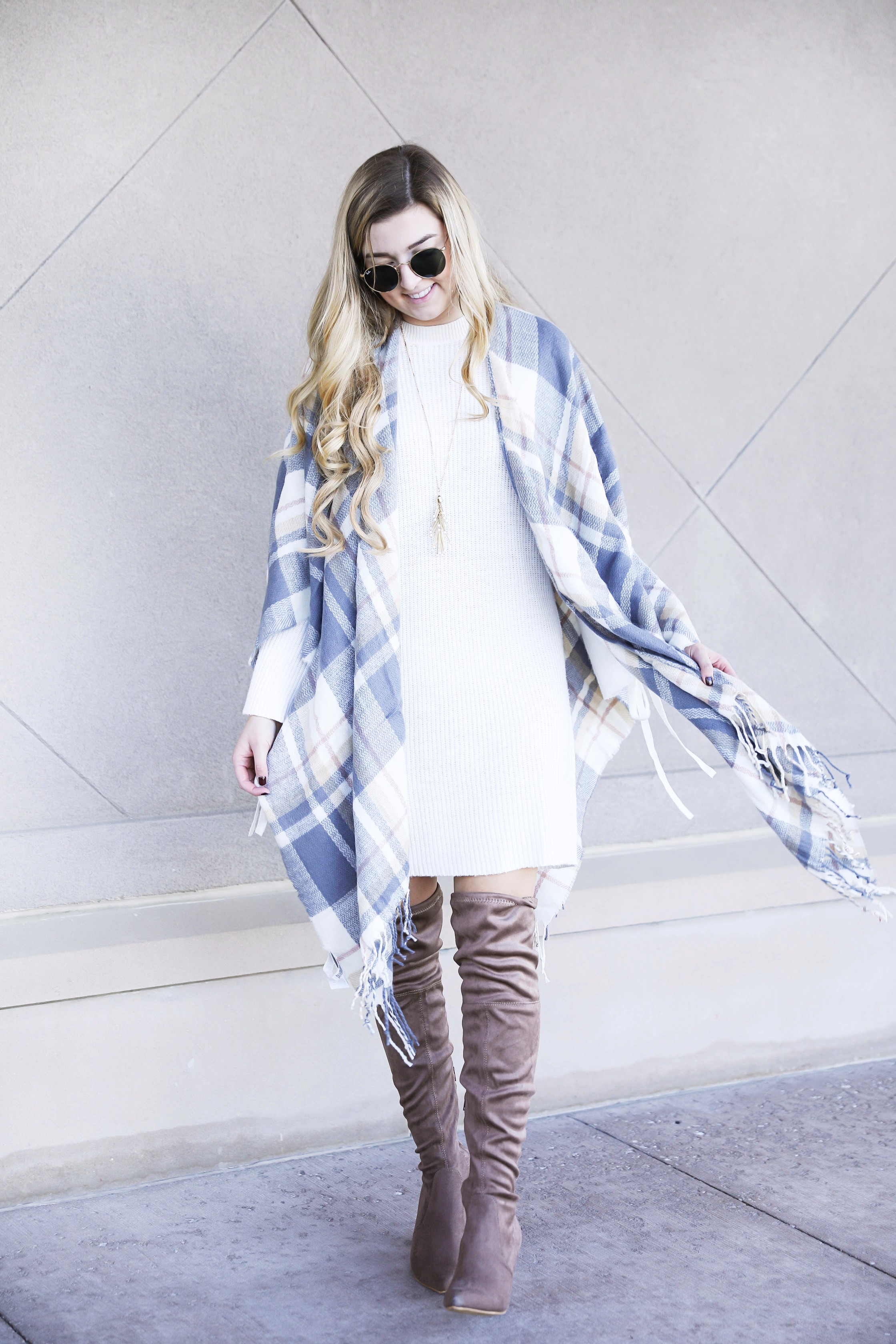 Plaid poncho and cute white sweater dress with tied sleeves! Cutest fall outfit! Check out the details on fashion blog daily dose of charm by lauren lindmark