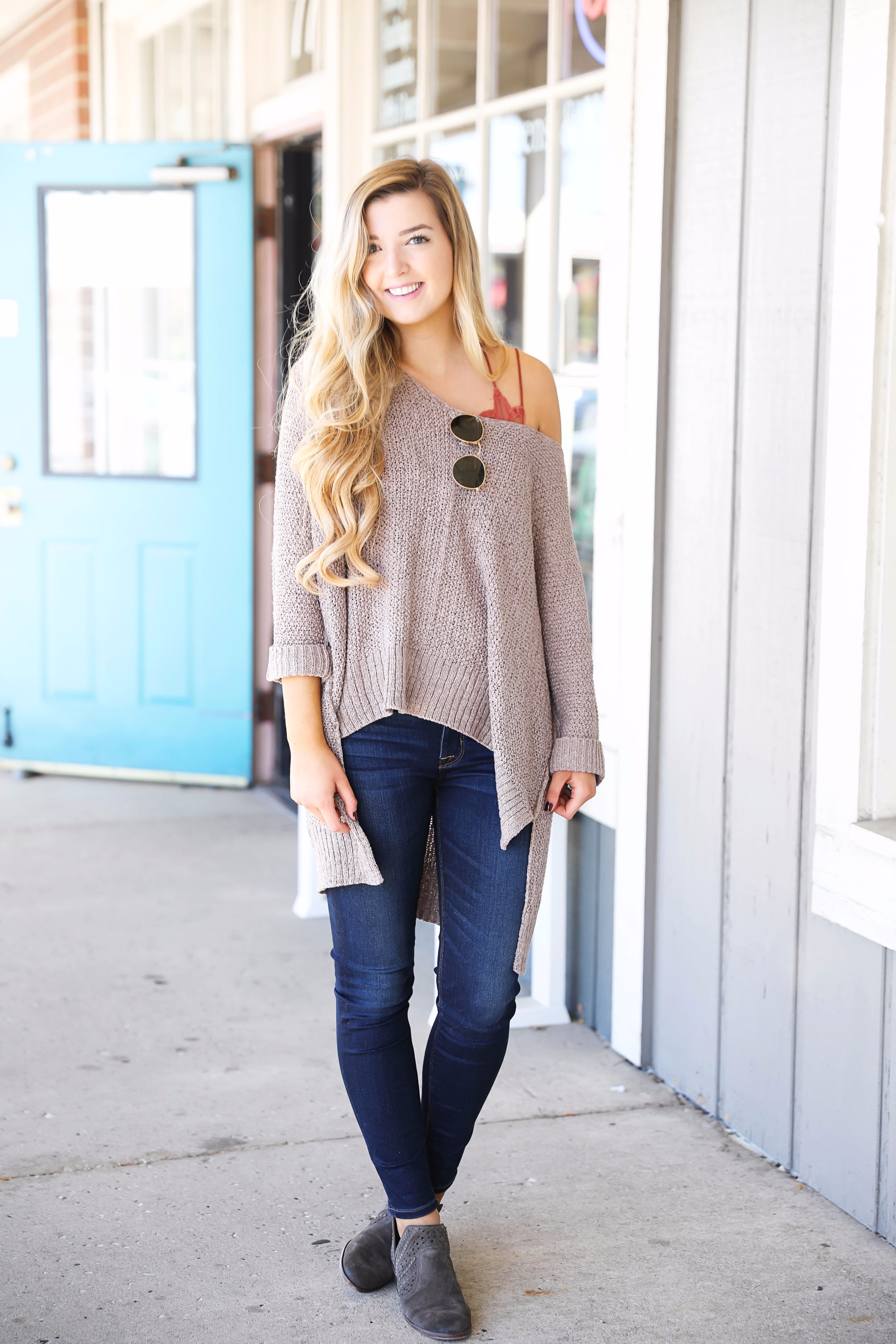 Slouchy off the shoulder sweater with a lace free people bralette! Super cute fall outfit for casual days or can be dressed up! Check out the details on fashion blog daily dose of charm by lauren lindmark