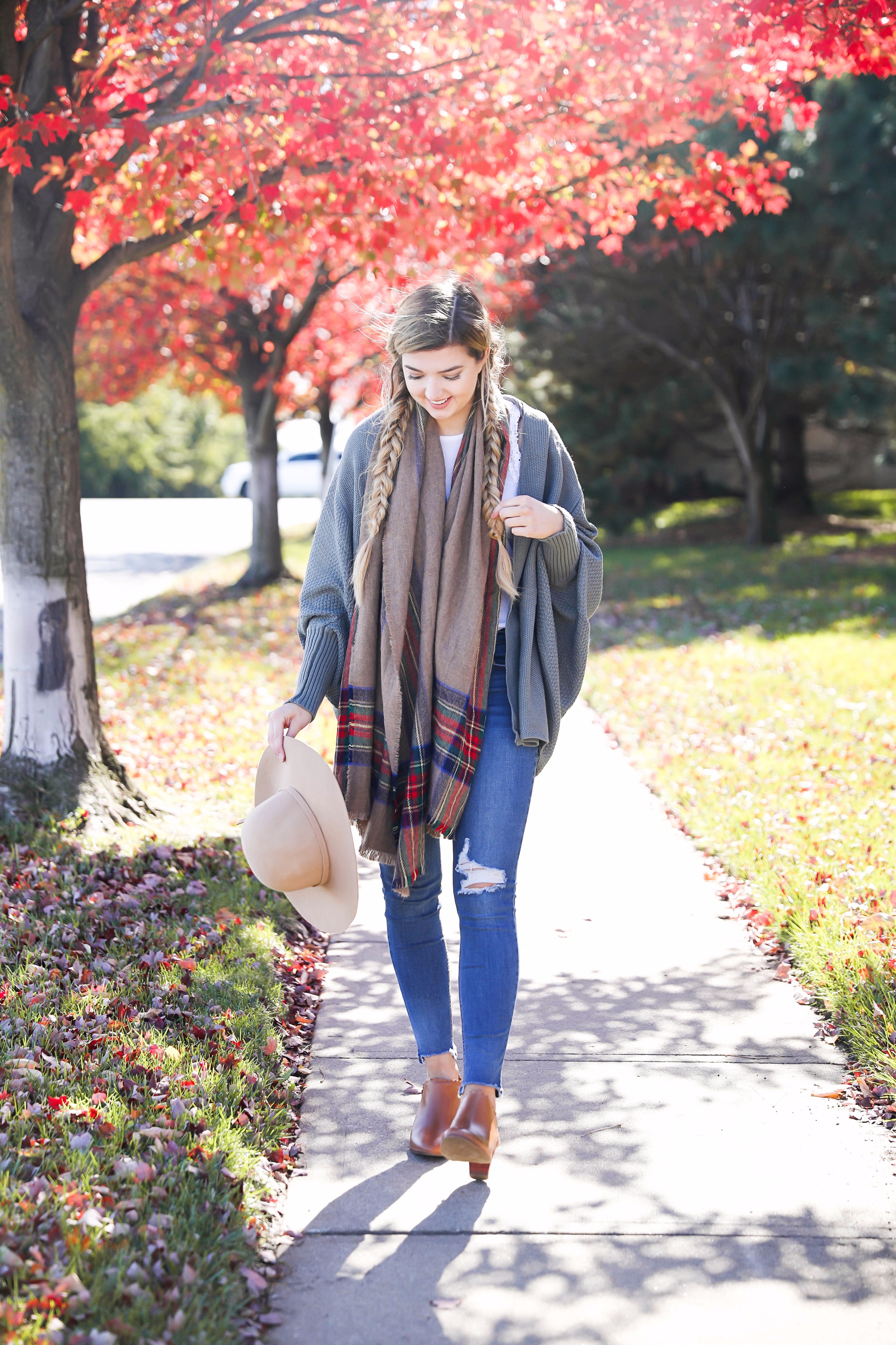 The perfect fall outfit with pretty fall leaves! Slouchy cardigan and plaid blanket scarf on fashion blog daily dose of charm by lauren lindmark