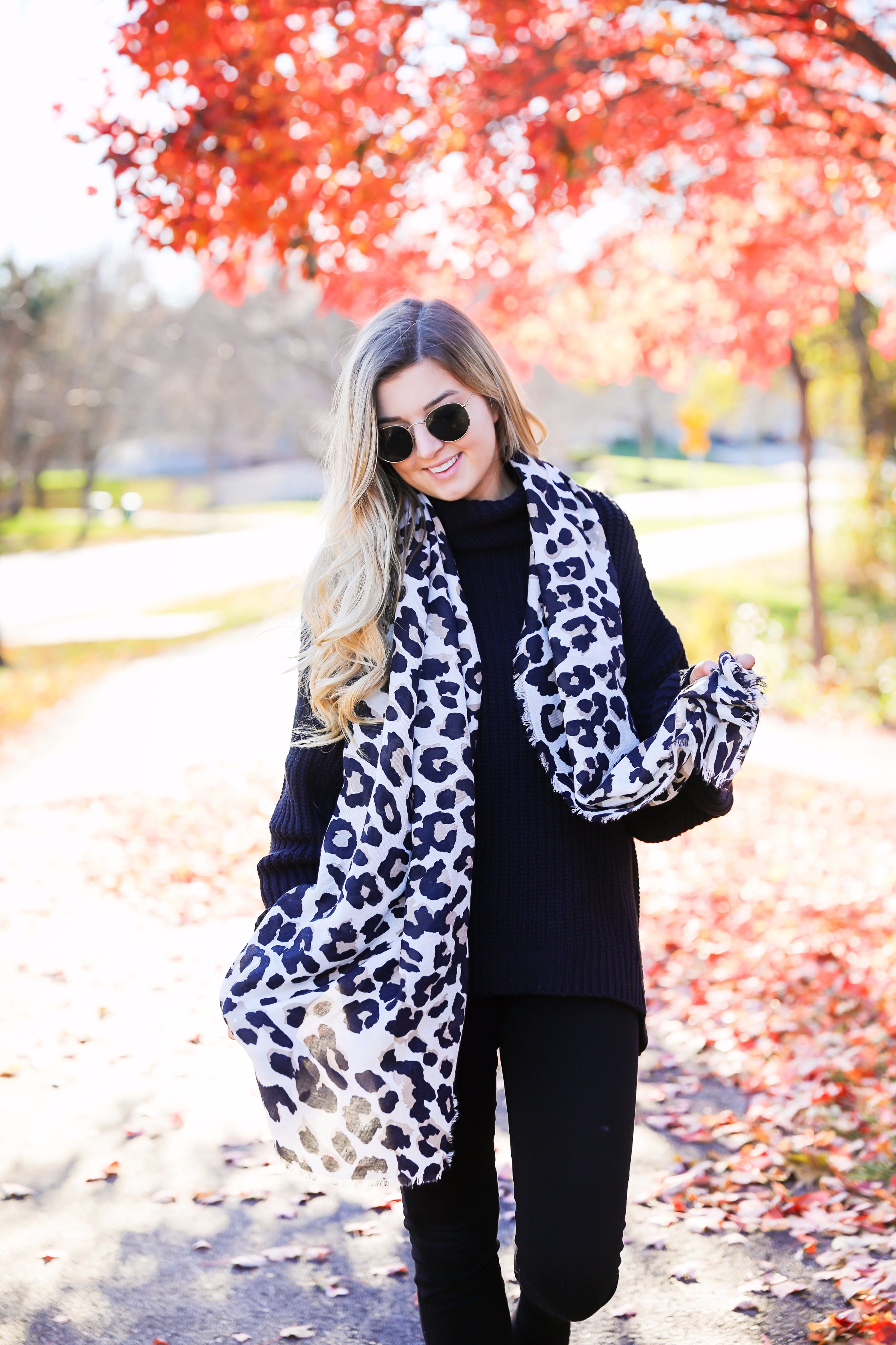 All black outfit with leopard scarf! Cute black sweater and black jeans with black booties! Plus a roundup of black friday and cyber monday sale deals on fashion blog daily dose of charm by lauren lindmark