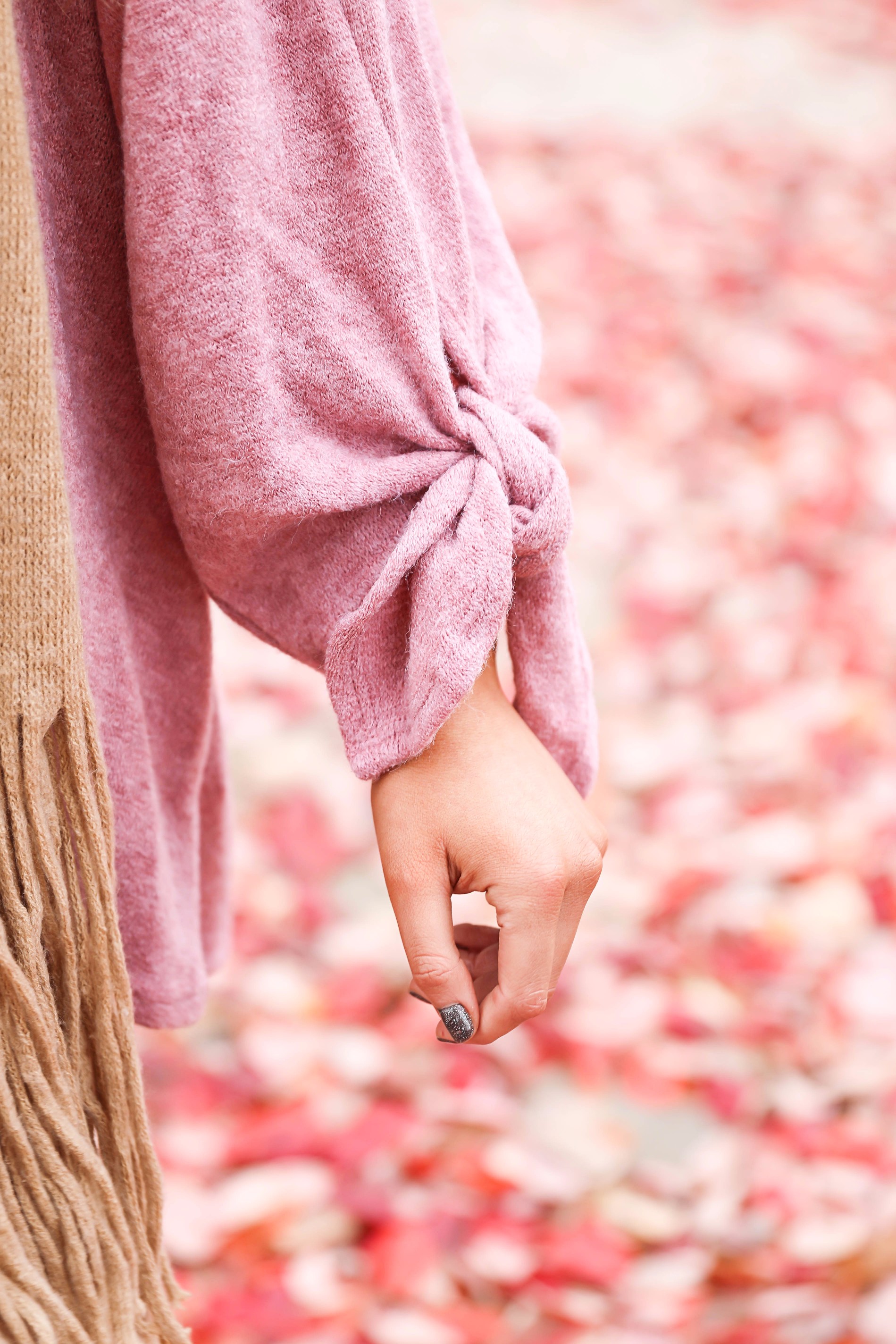 Big fringe scarf with pink tied sweater and pink beanie! Perfect girly fall outfit! Find details on fashion blog daily dose of charm by lauren lindmark