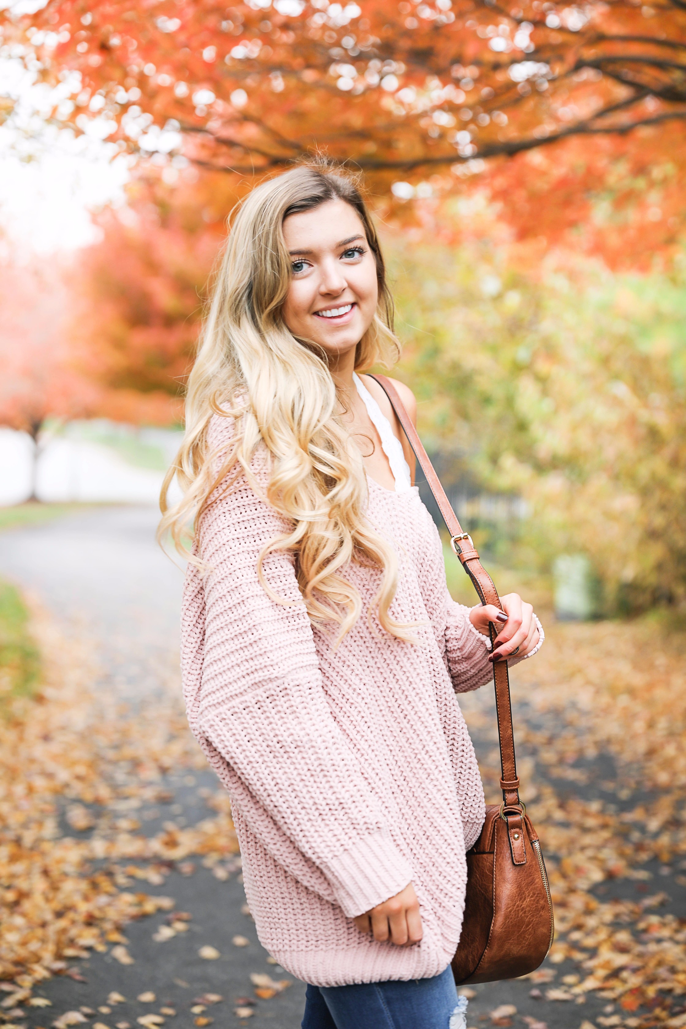 Pink slouchy sweater with cream free people bralette! The perfect sweater for bralettes! Pretty fall foliage photoshoot on fashion blog daily dose of charm by lauren lindmark