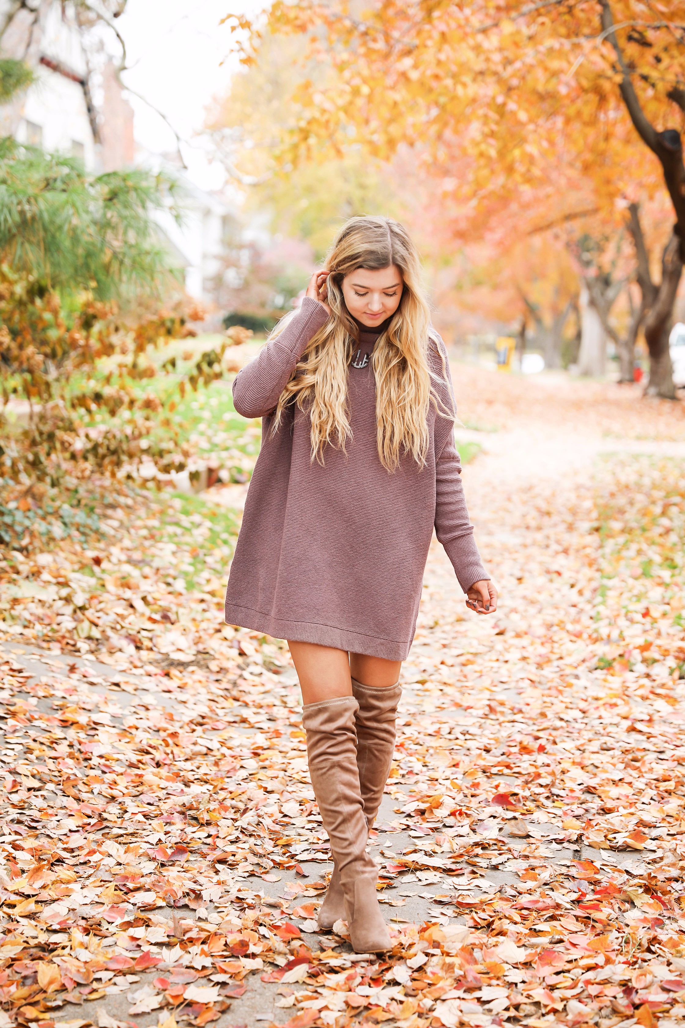 Purple free people Ottoman Slouchy Tunics weater dress! This cute fall look is perfect paired with brown suede over the knee boots! Find the details on fashion blog daily dose of charm by lauren lindmark