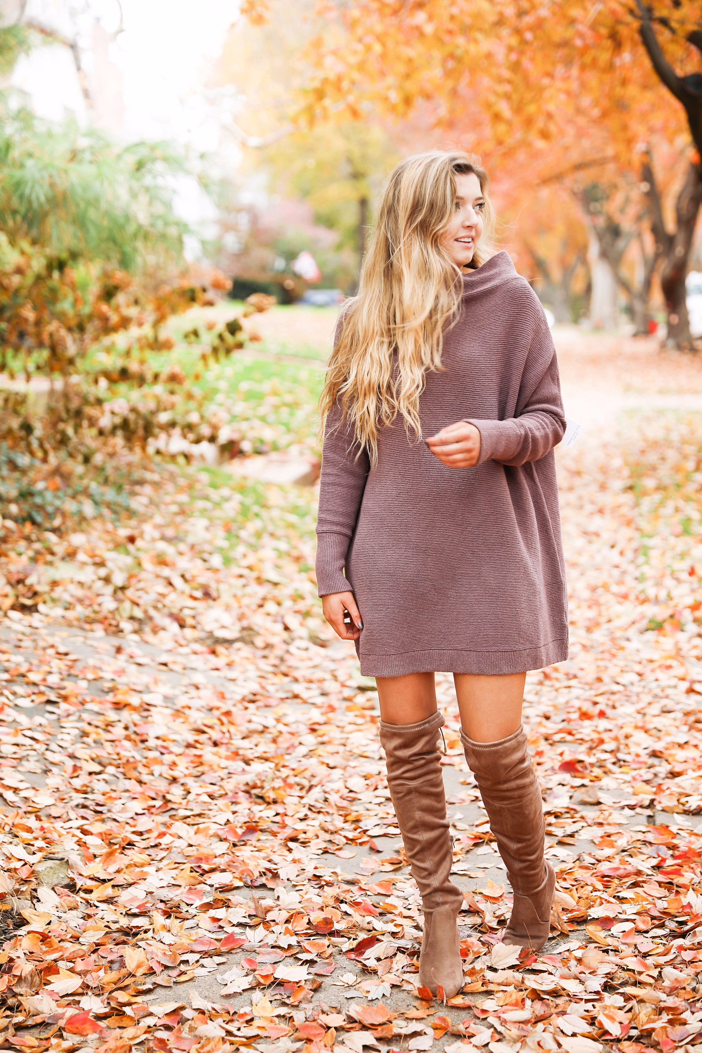 Purple free people Ottoman Slouchy Tunics weater dress! This cute fall look is perfect paired with brown suede over the knee boots! Find the details on fashion blog daily dose of charm by lauren lindmark