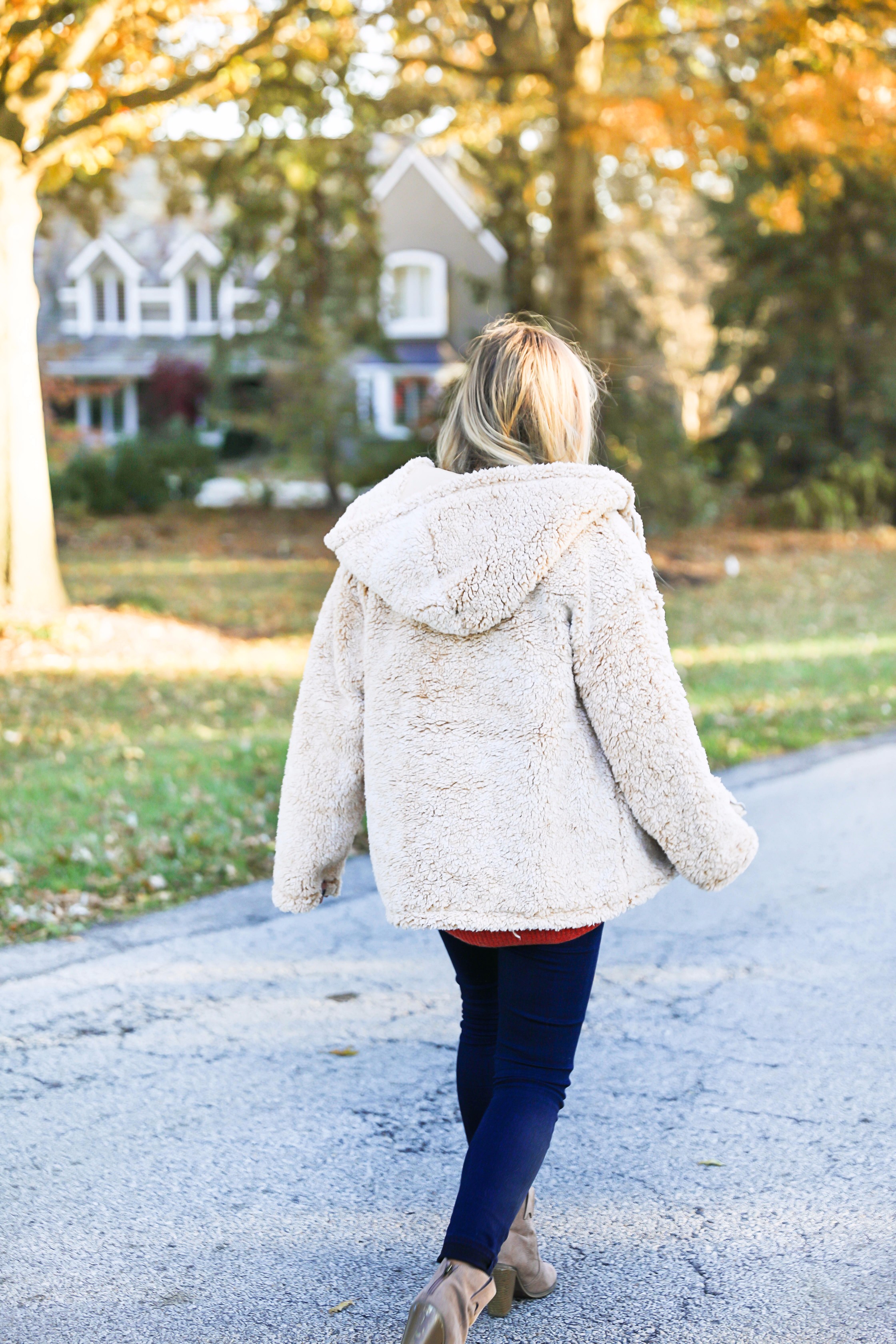 Red sweater and teddy bear coat! This adorable fall outfit is so cozy and the teddy bear coat is so inexpensive! Find the details on fashion blog daily dose of charm by lauren lindmark