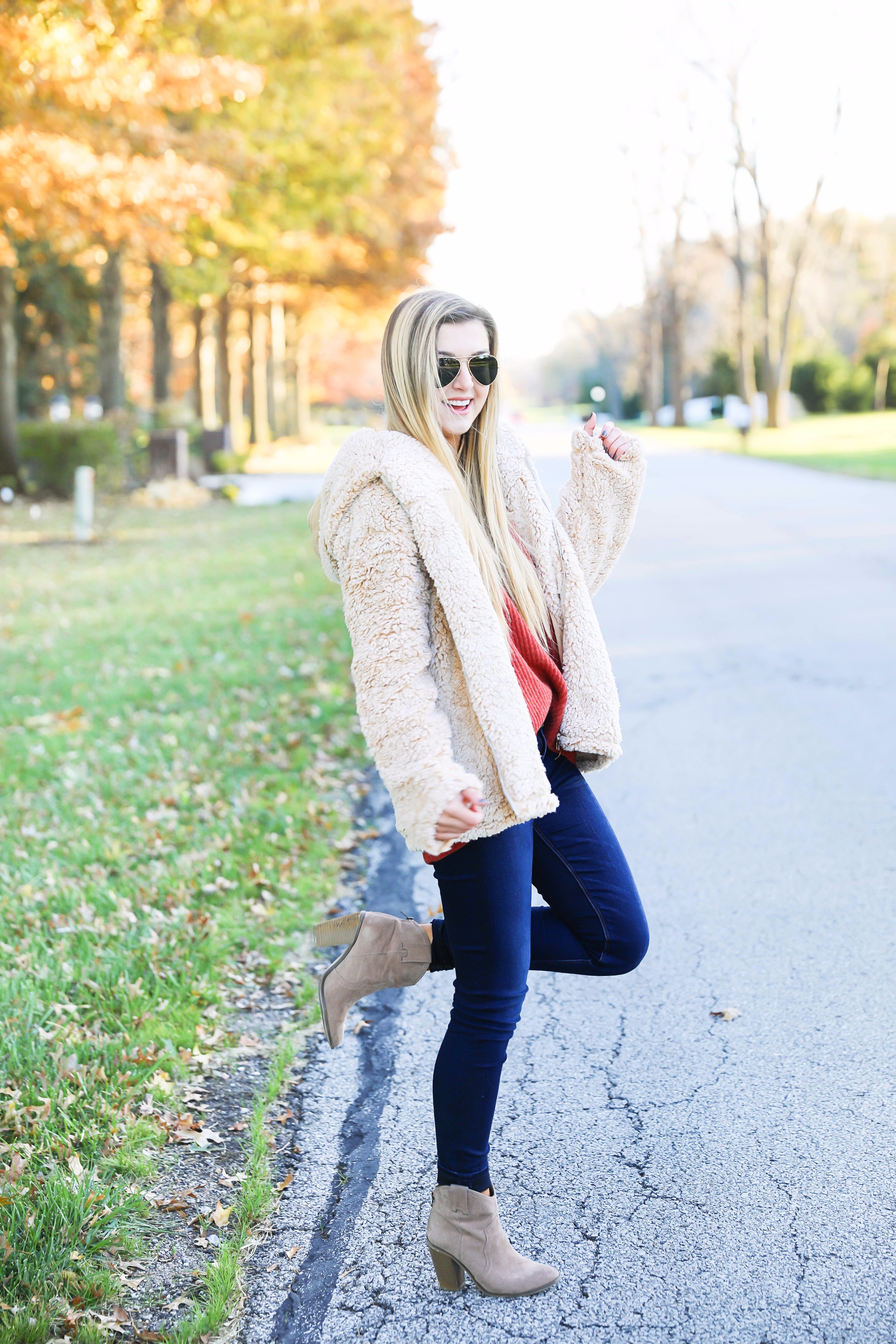 Red sweater and teddy bear coat! This adorable fall outfit is so cozy and the teddy bear coat is so inexpensive! Find the details on fashion blog daily dose of charm by lauren lindmark