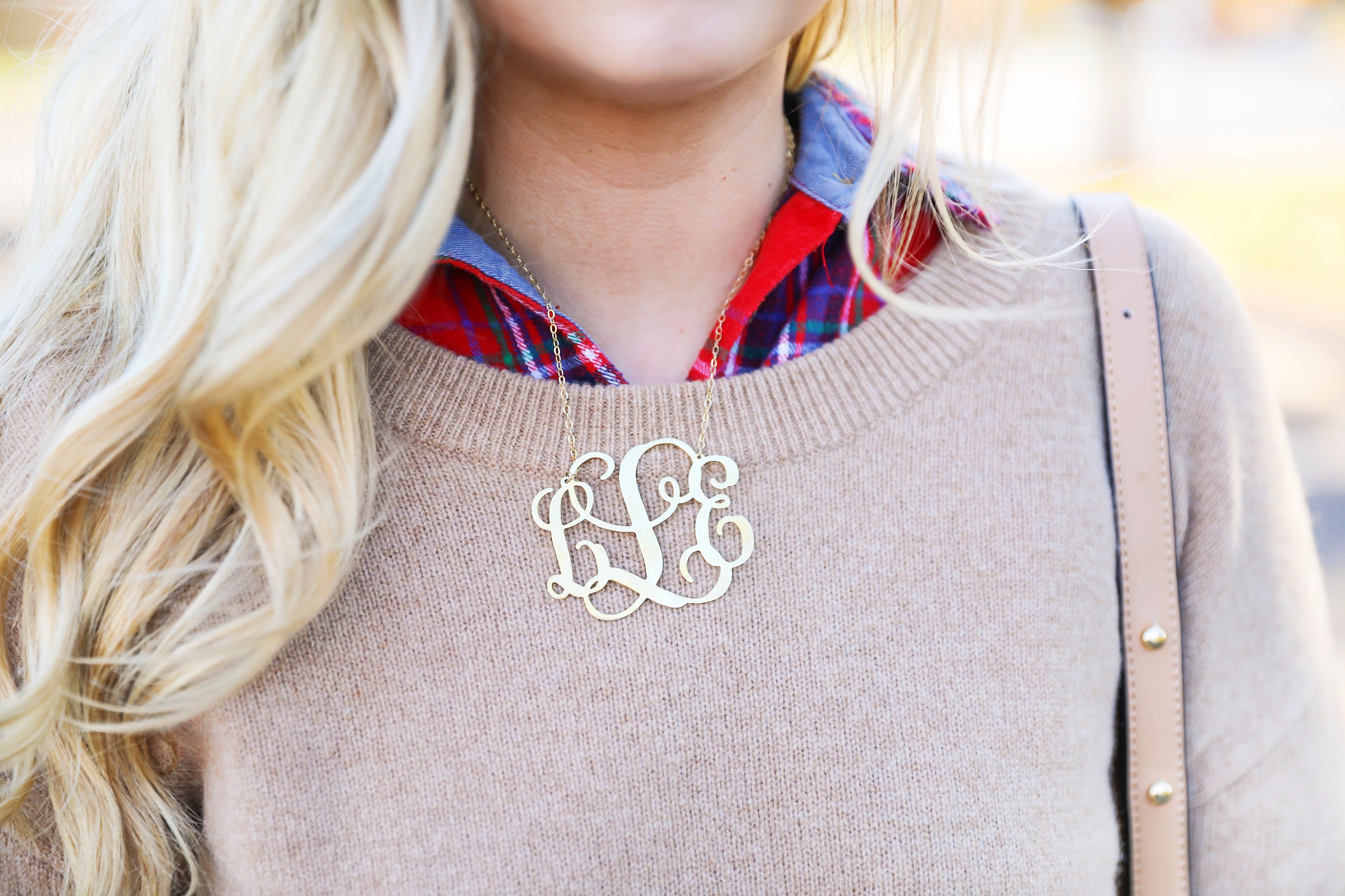 Thanksgiving outfit idea tan dress with tied sleeves! Layered with flannel underneath! I love this fall outfit with hunter boots! Details on fashion blog daily dose of charm by lauren lindmark