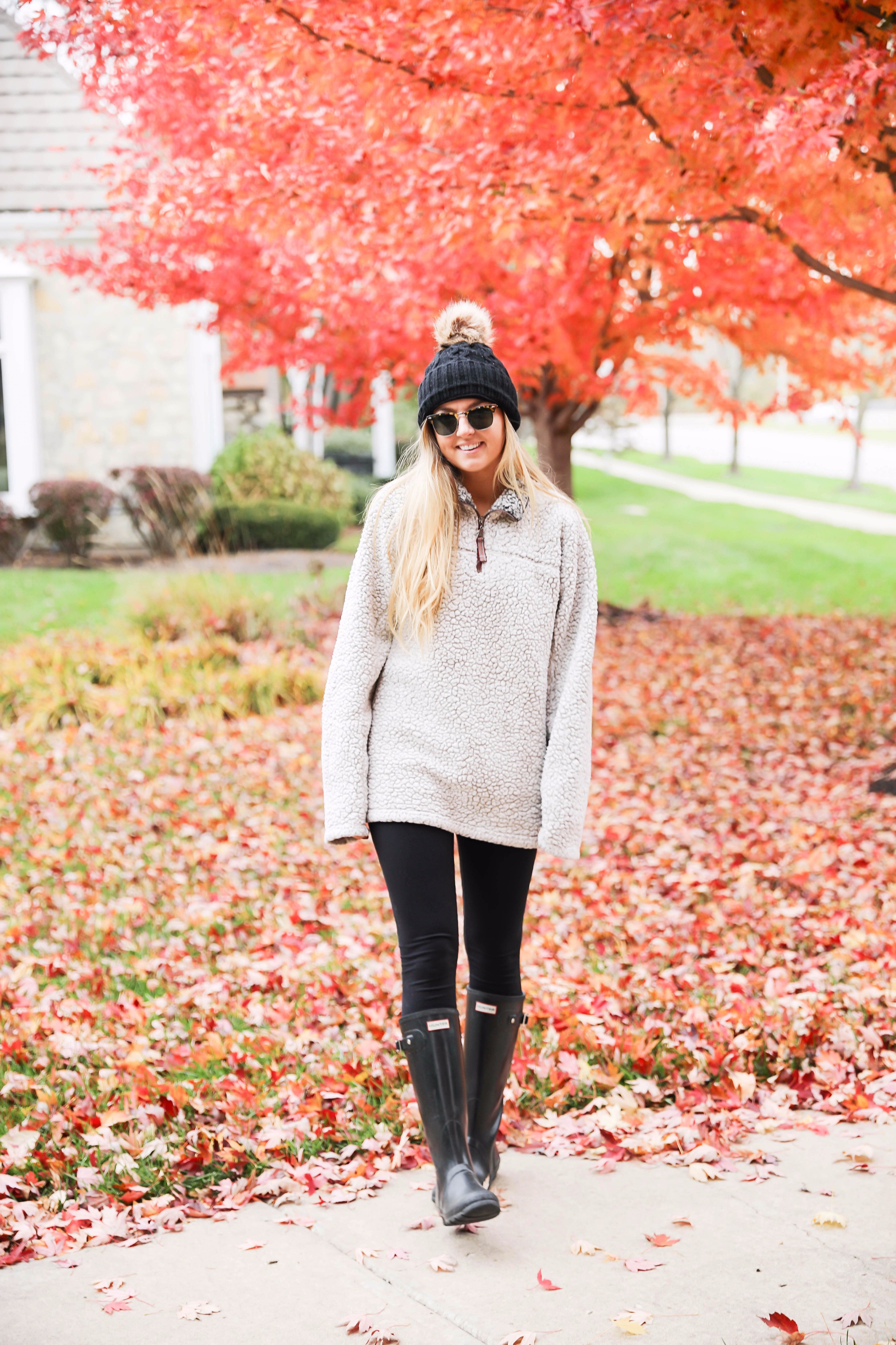 True grit sweatshirt with faux fur black beanie! Cute and comfy fall fashion! Find the details on daily dose of charm lauren lindmark