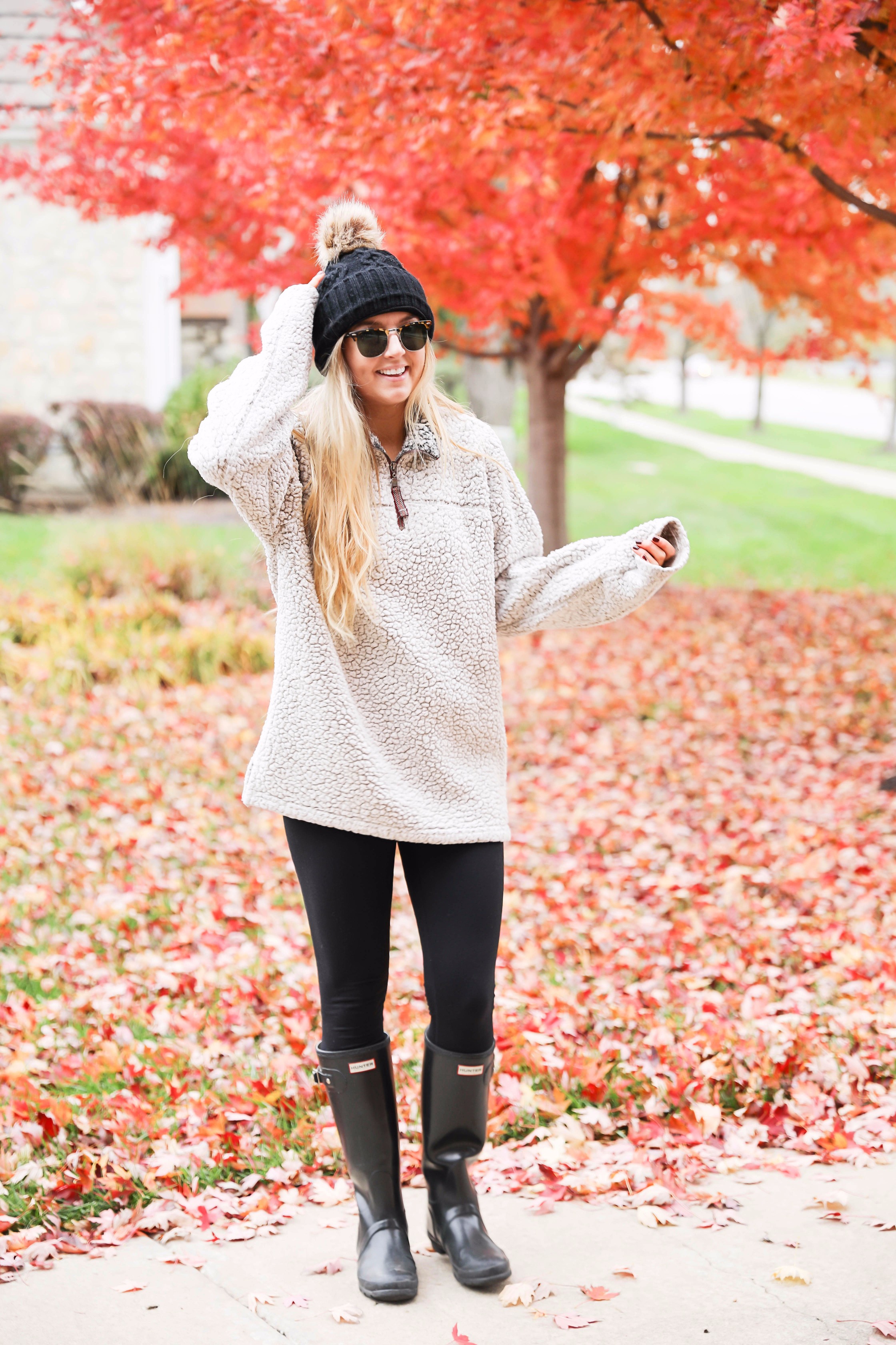 True grit sweatshirt with faux fur black beanie! Cute and comfy fall fashion! Find the details on daily dose of charm lauren lindmark