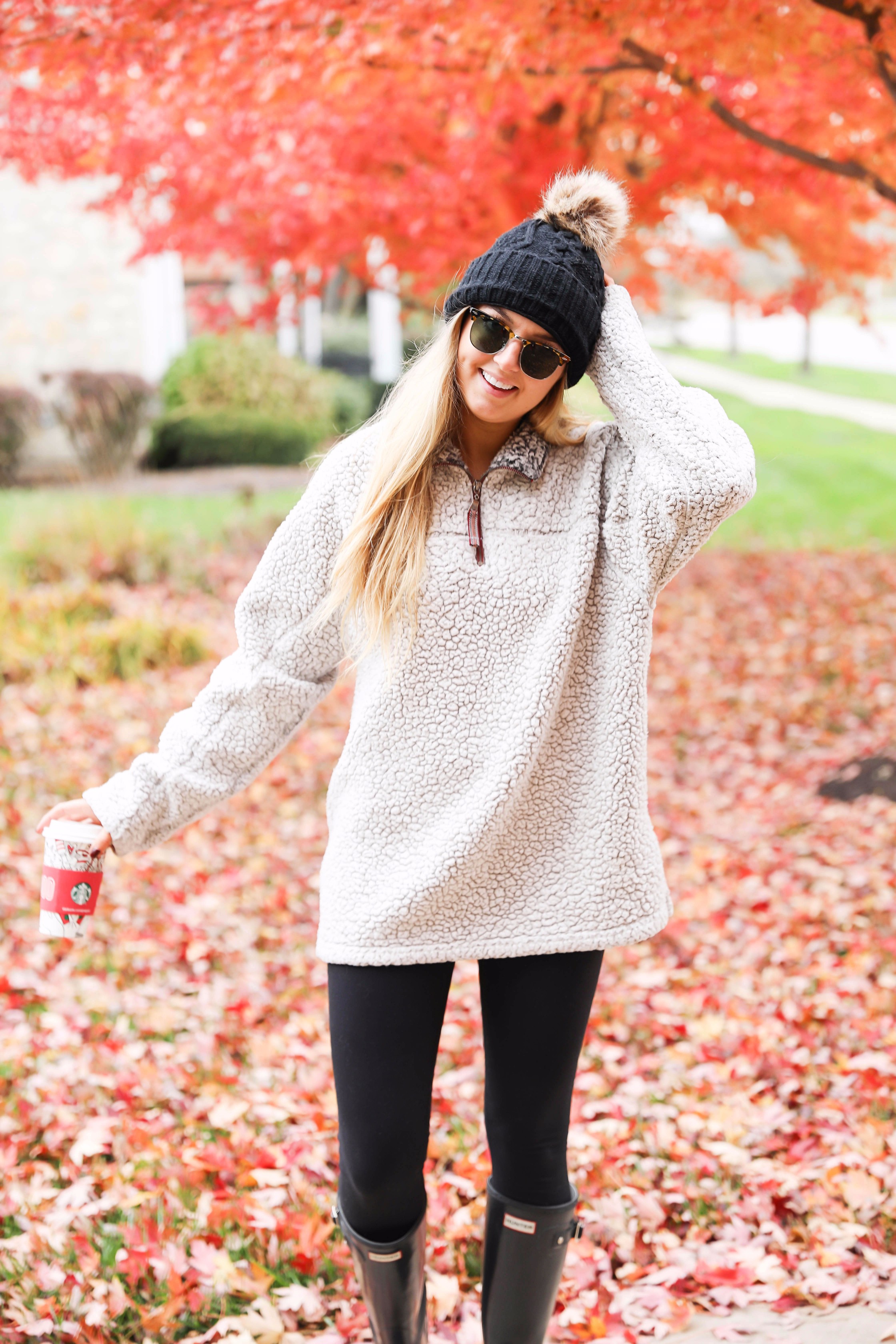 True grit sweatshirt with faux fur black beanie! Cute and comfy fall fashion! Find the details on daily dose of charm lauren lindmark