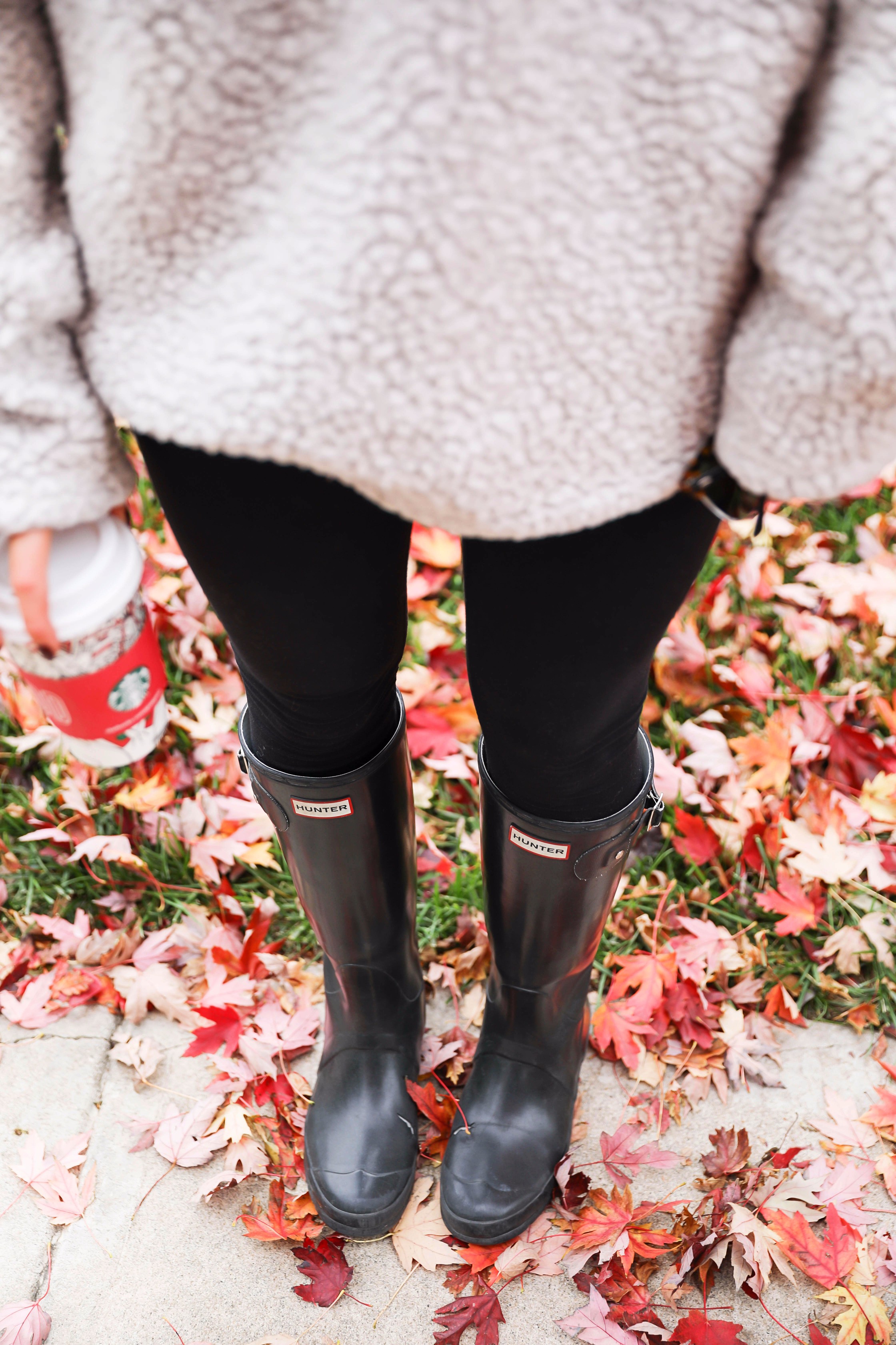 True grit sweatshirt with faux fur black beanie! Cute and comfy fall fashion! Find the details on daily dose of charm lauren lindmark