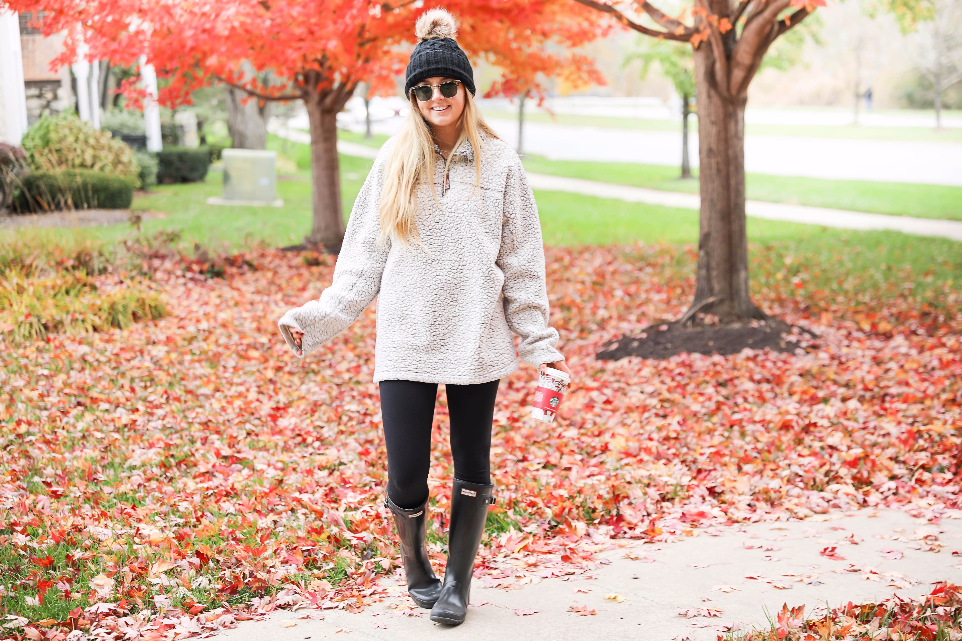 True grit sweatshirt with faux fur black beanie! Cute and comfy fall fashion! Find the details on daily dose of charm lauren lindmark