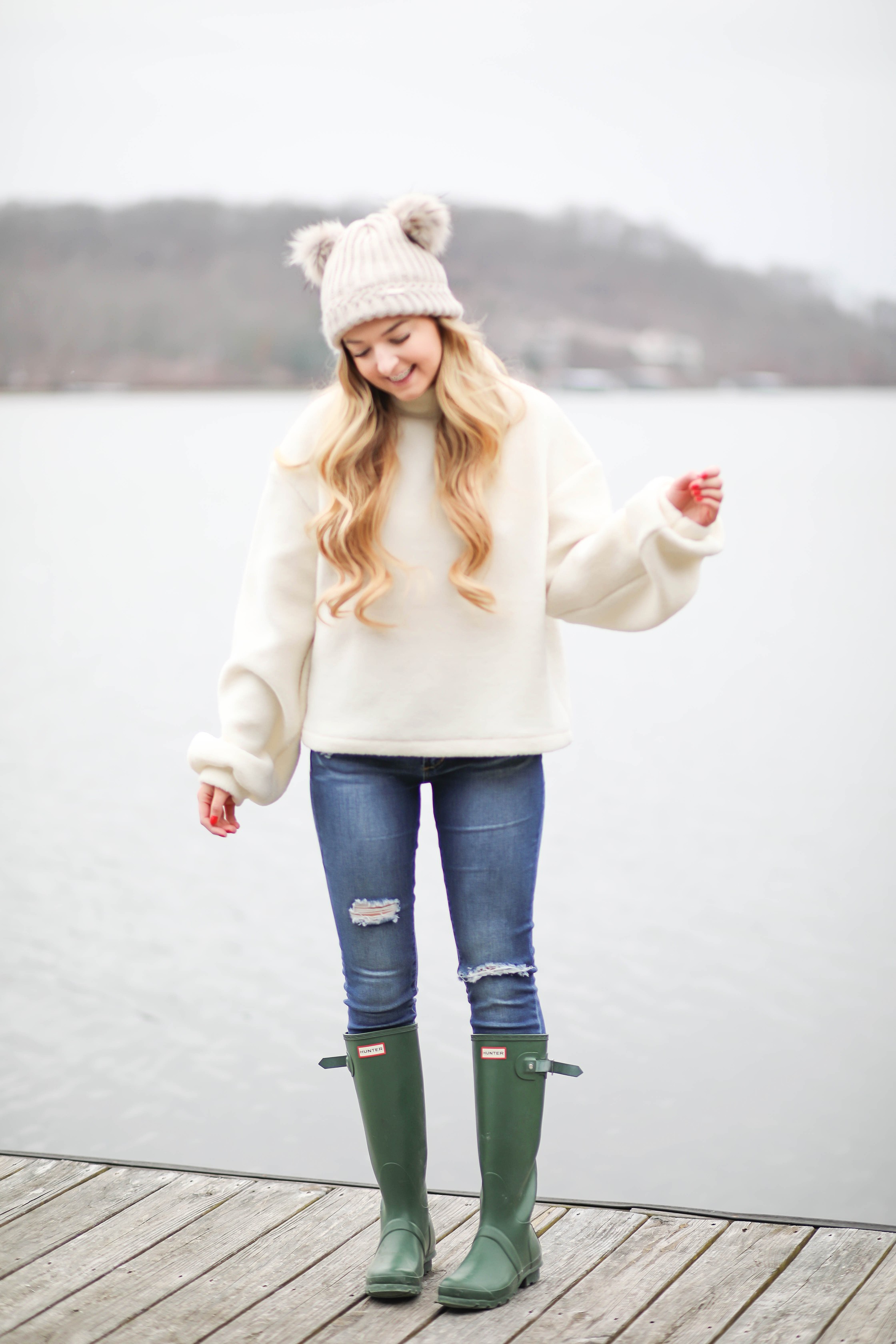 Cozy soft sweater and pom pom beanie! How to wear your hair with a beanie! Beanie hairstyle ideas! Get the details on fashion blog daily dose of charm by lauren lindmark