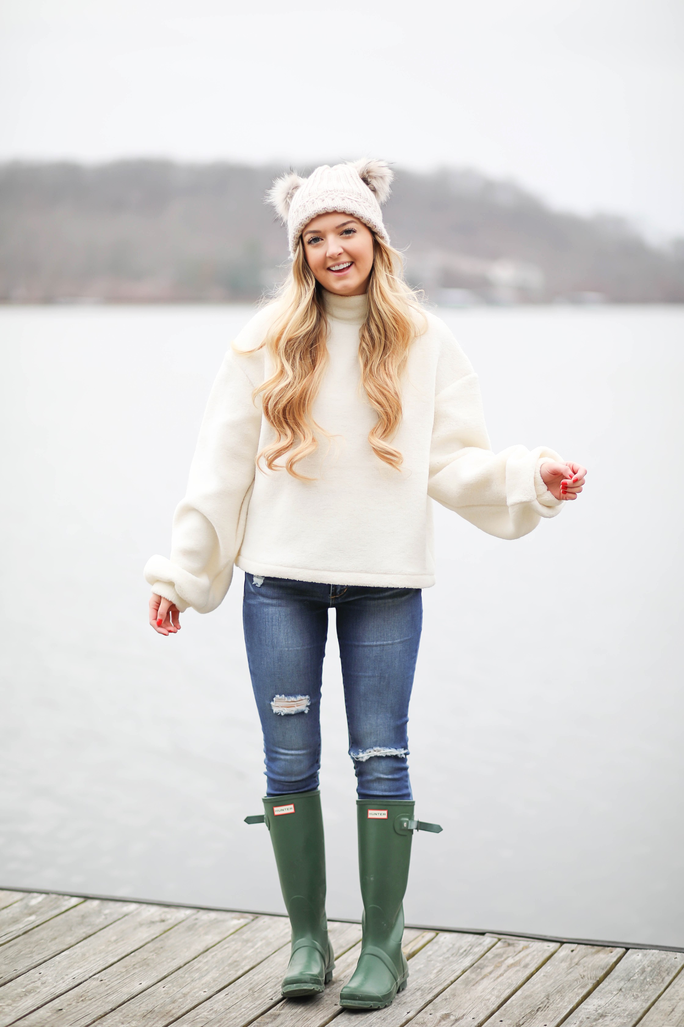 Cozy soft sweater and pom pom beanie! How to wear your hair with a beanie! Beanie hairstyle ideas! Get the details on fashion blog daily dose of charm by lauren lindmark