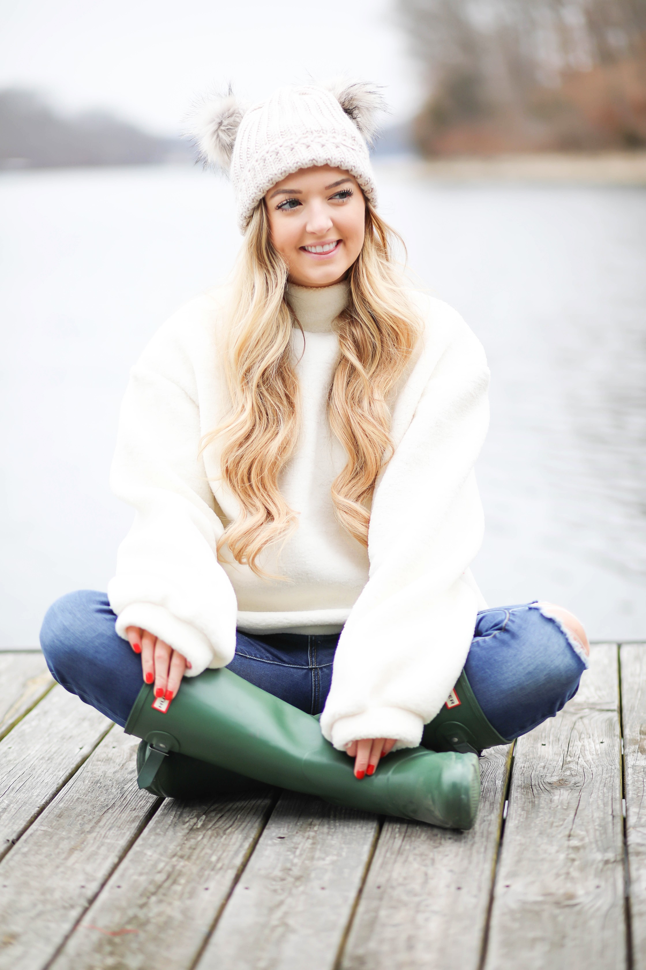 Cozy soft sweater and pom pom beanie! How to wear your hair with a beanie! Beanie hairstyle ideas! Get the details on fashion blog daily dose of charm by lauren lindmark