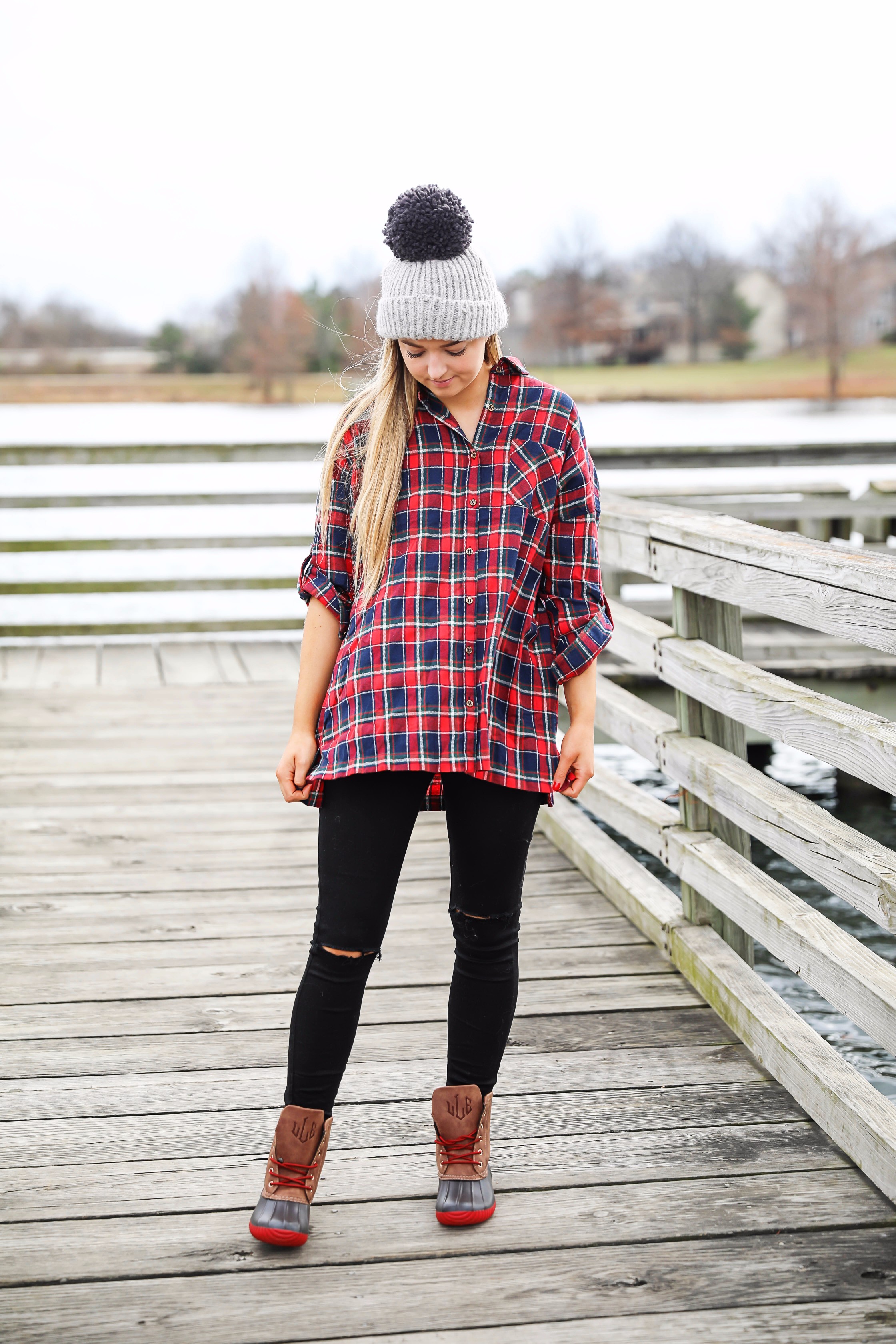 Cute flannel outfit with beanie and monogramed duck boots! Cute fall and winter camping outfit idea! Details on the fashion blog daily dose of charm by lauren lindmark